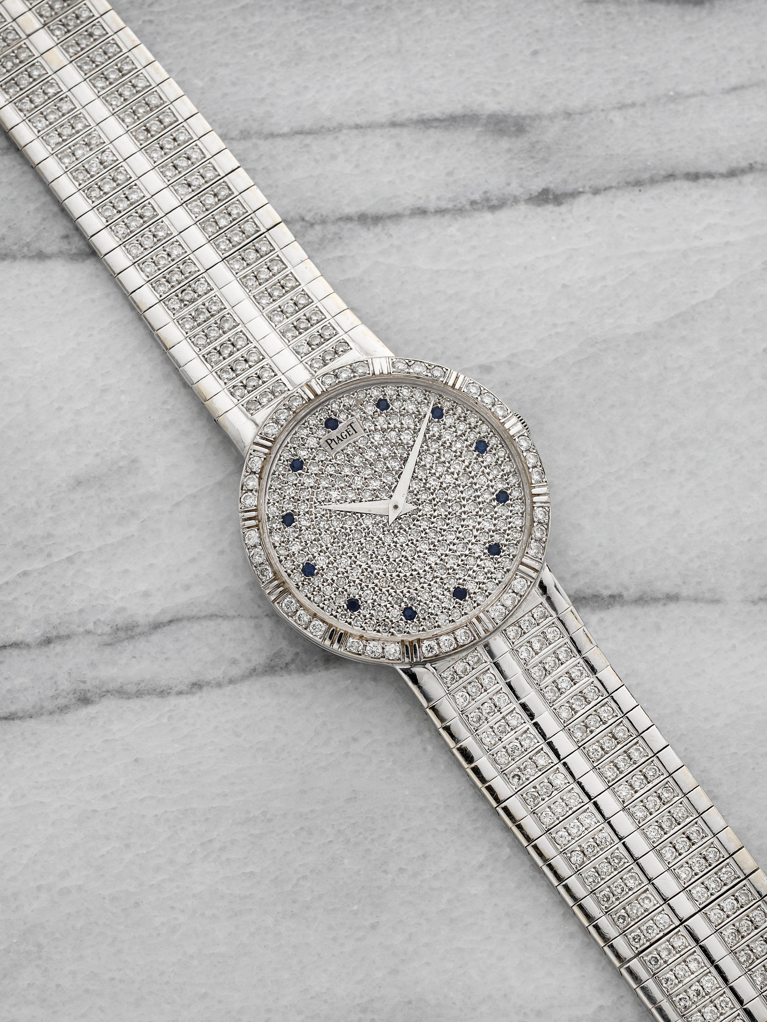 Piaget 8025 – Integrated WG with Pave Diamond & Sapphire Dial