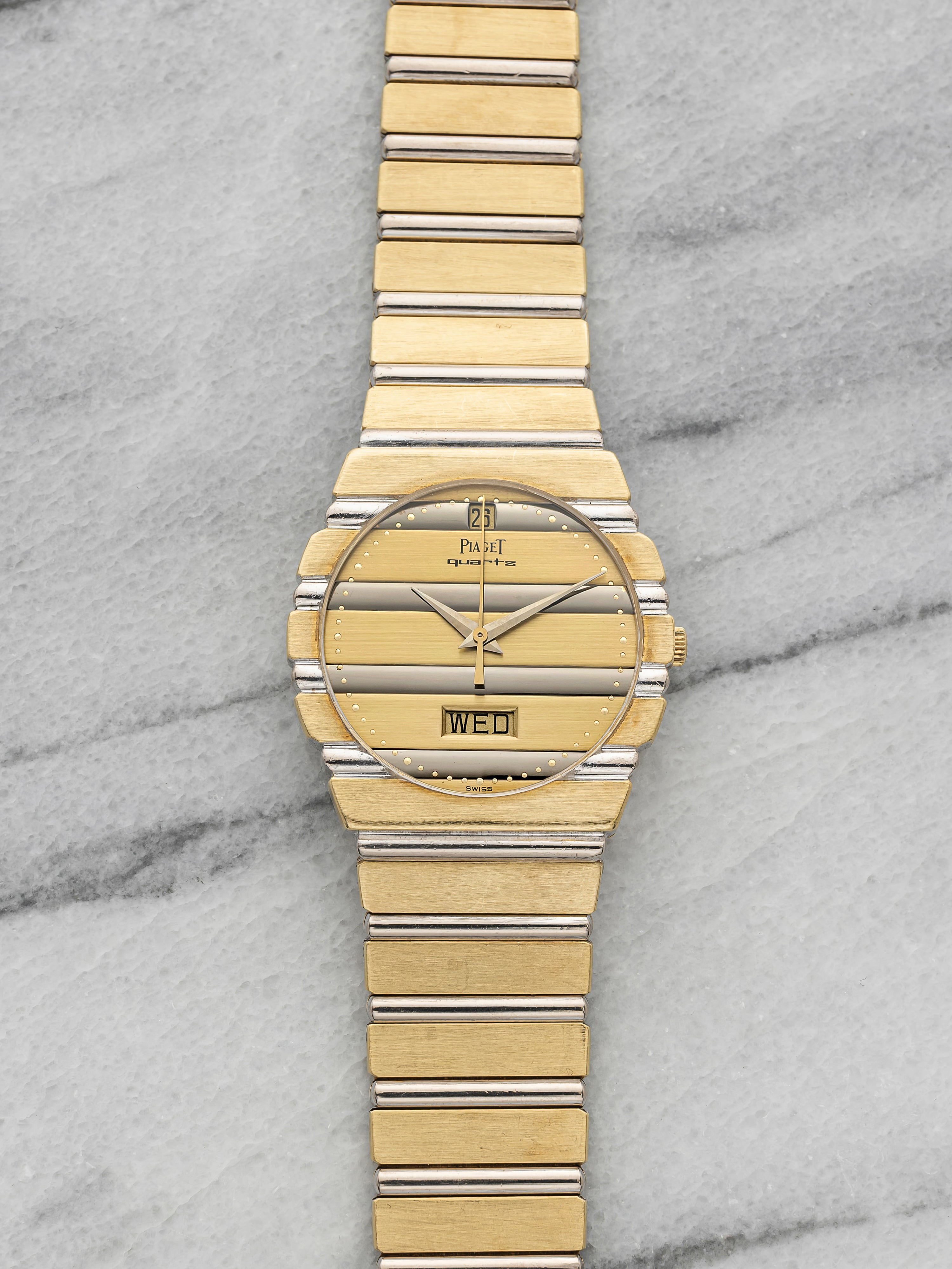 Vintage 1980s Piaget Polo 15562 C701 Two Tone 18K Gold Champagne Quartz 31mm