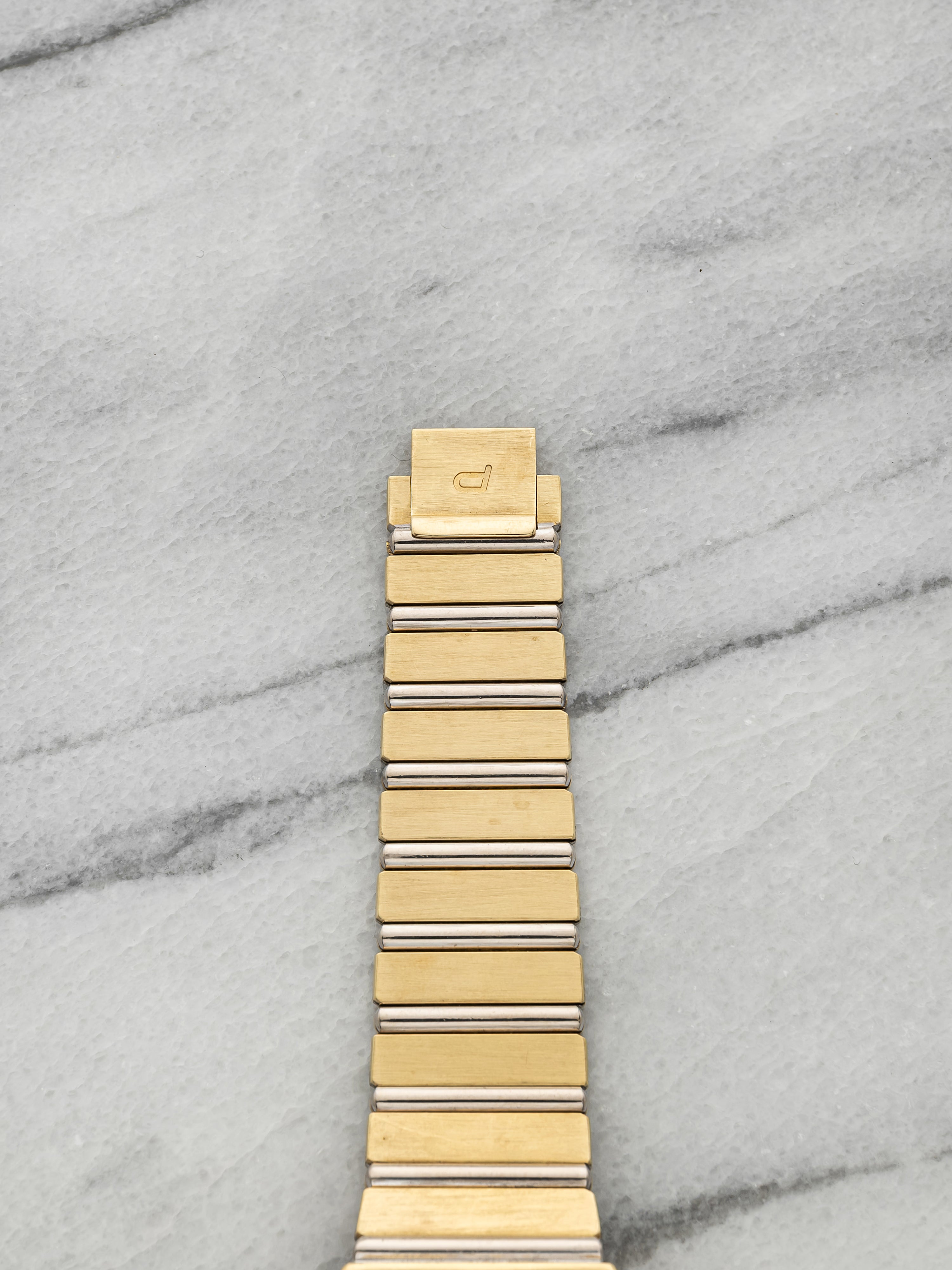 Vintage 1980s Piaget Polo 15562 C701 Two Tone 18K Gold Champagne Quartz 31mm
