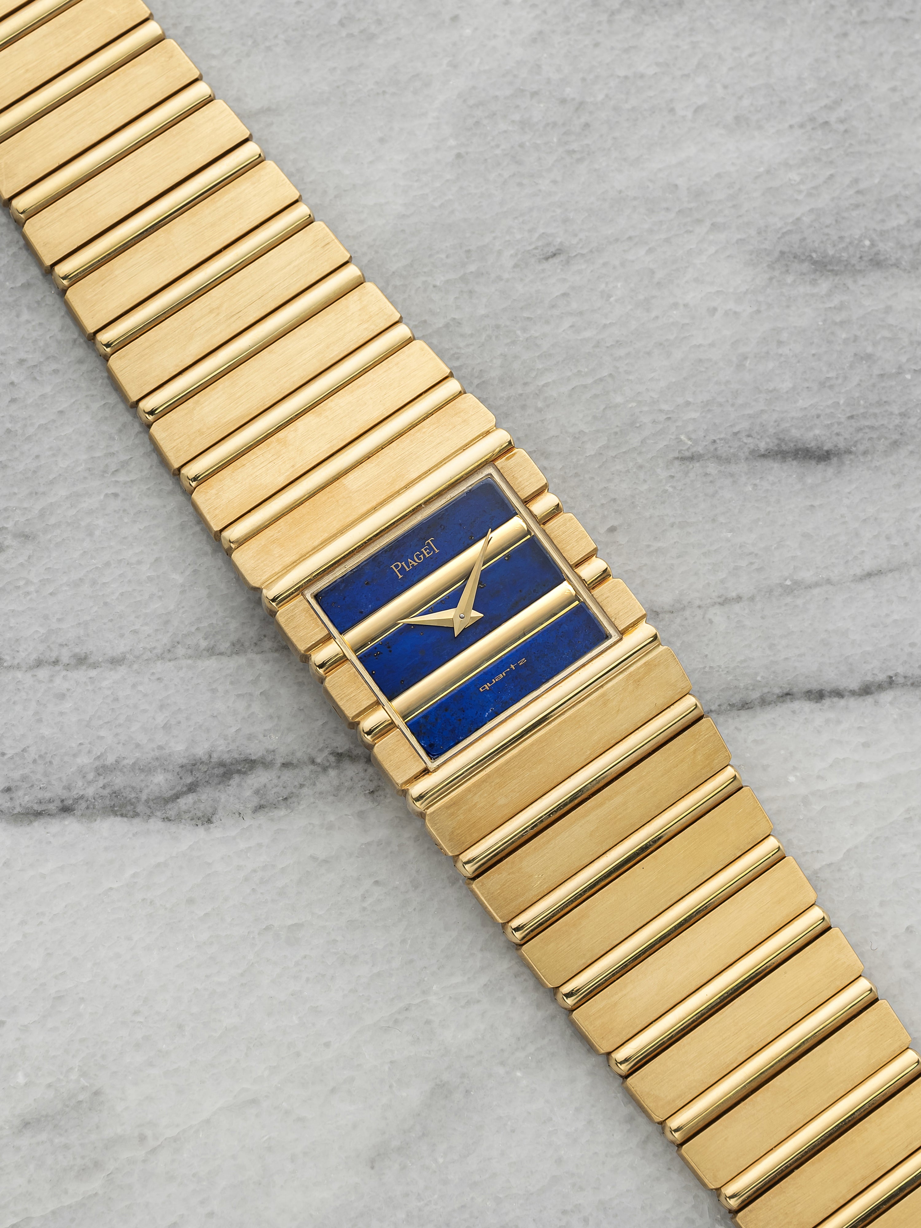 Vintage 1980s Piaget Polo 7131 C 701 18K YG Lapis Lazuli Dial Quartz 25mm
