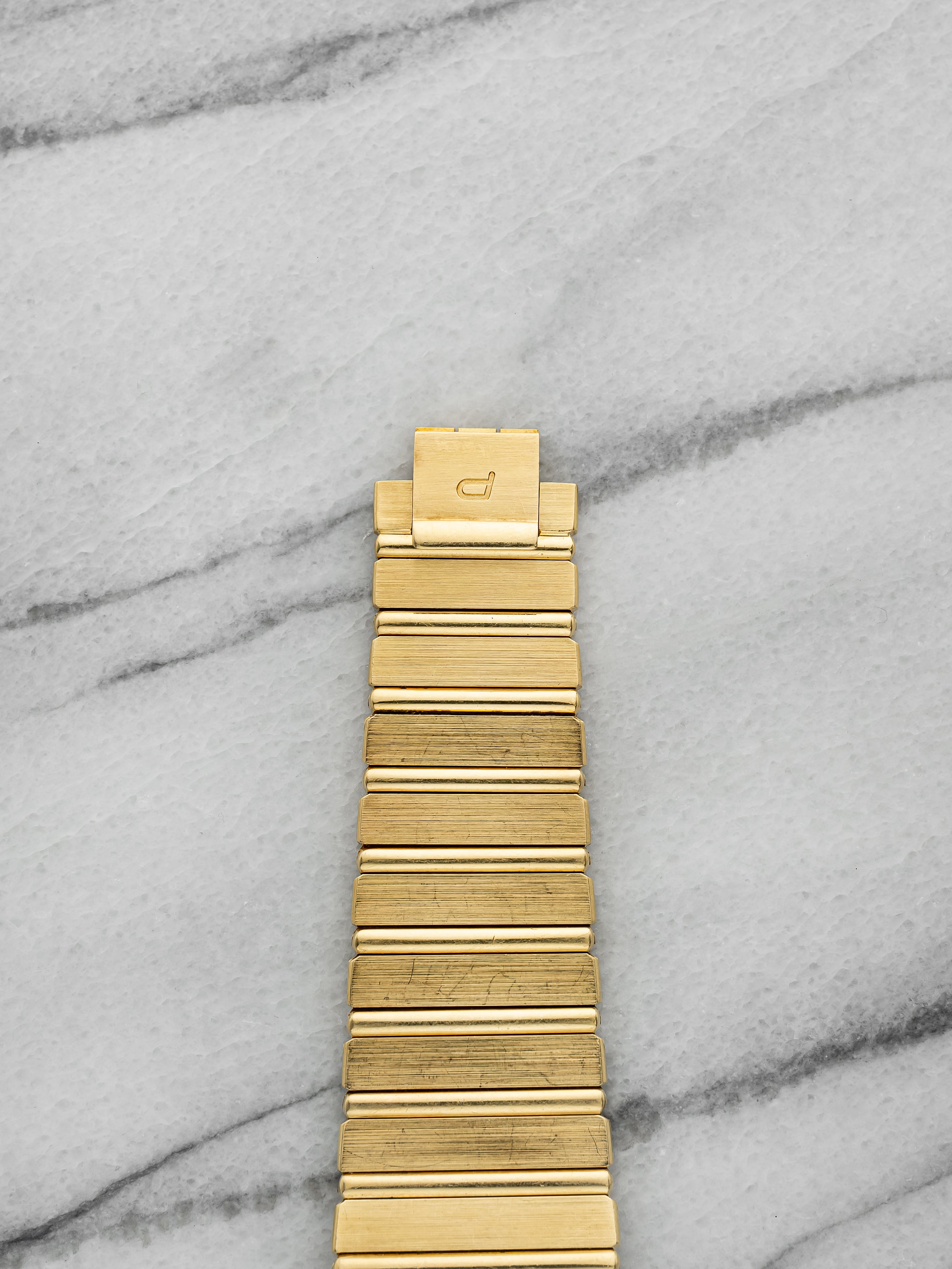 Vintage 1980s Piaget Polo 7131 C 701 18K Yellow Gold Gadroon Dial Quartz 25 mm