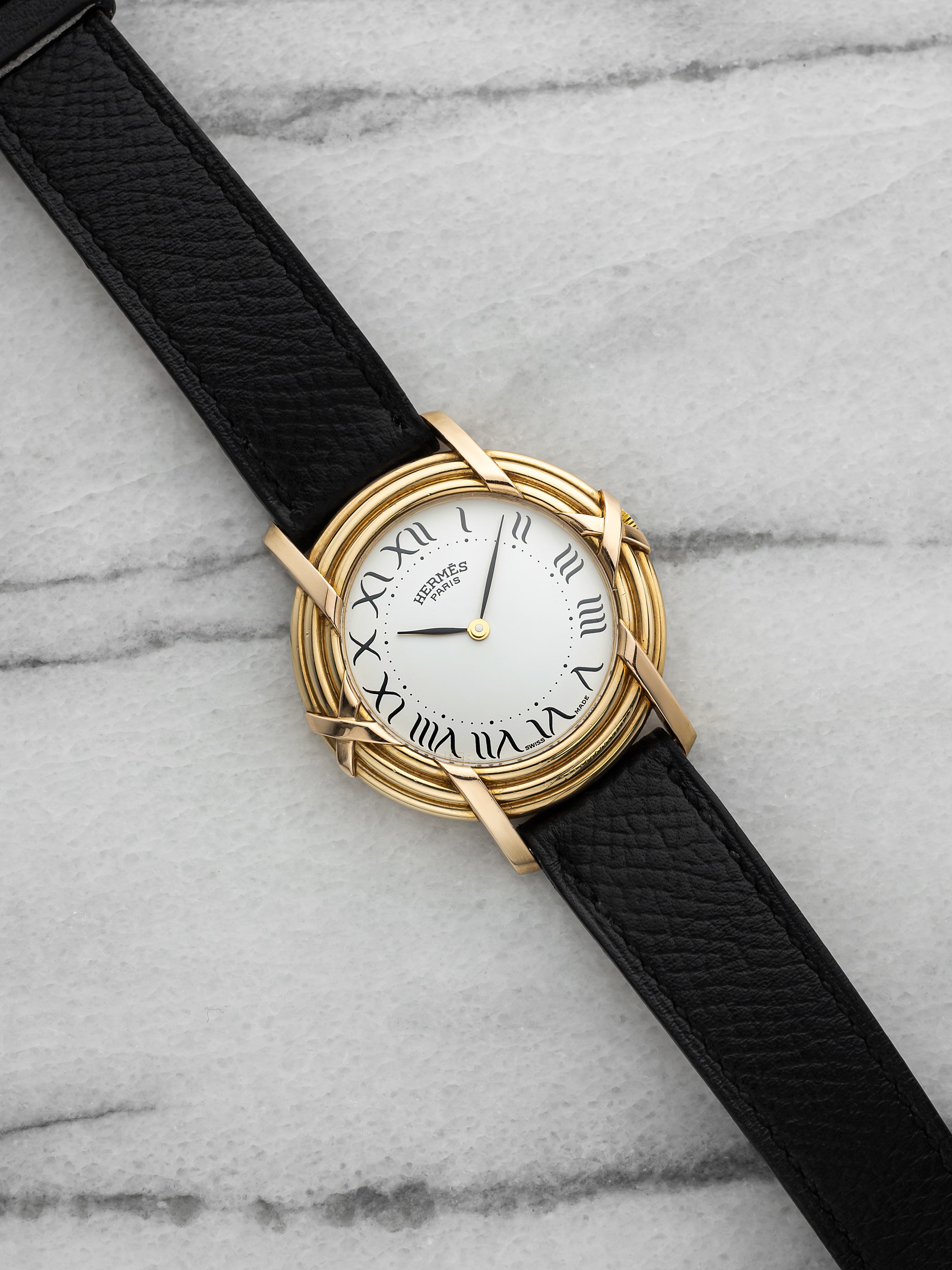 2000s Hermes Ribbon 18K Yellow Gold White Roman Dial Quartz 33 mm