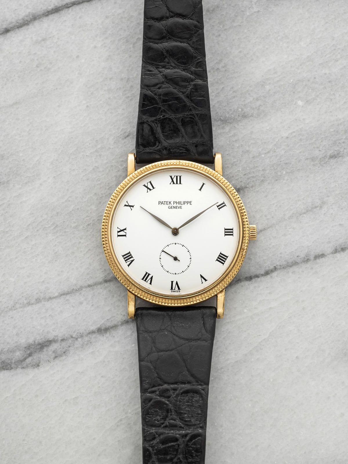 2000s Patek Philippe Calatrava 3919 18K Yellow Gold White Dial Manual 33mm