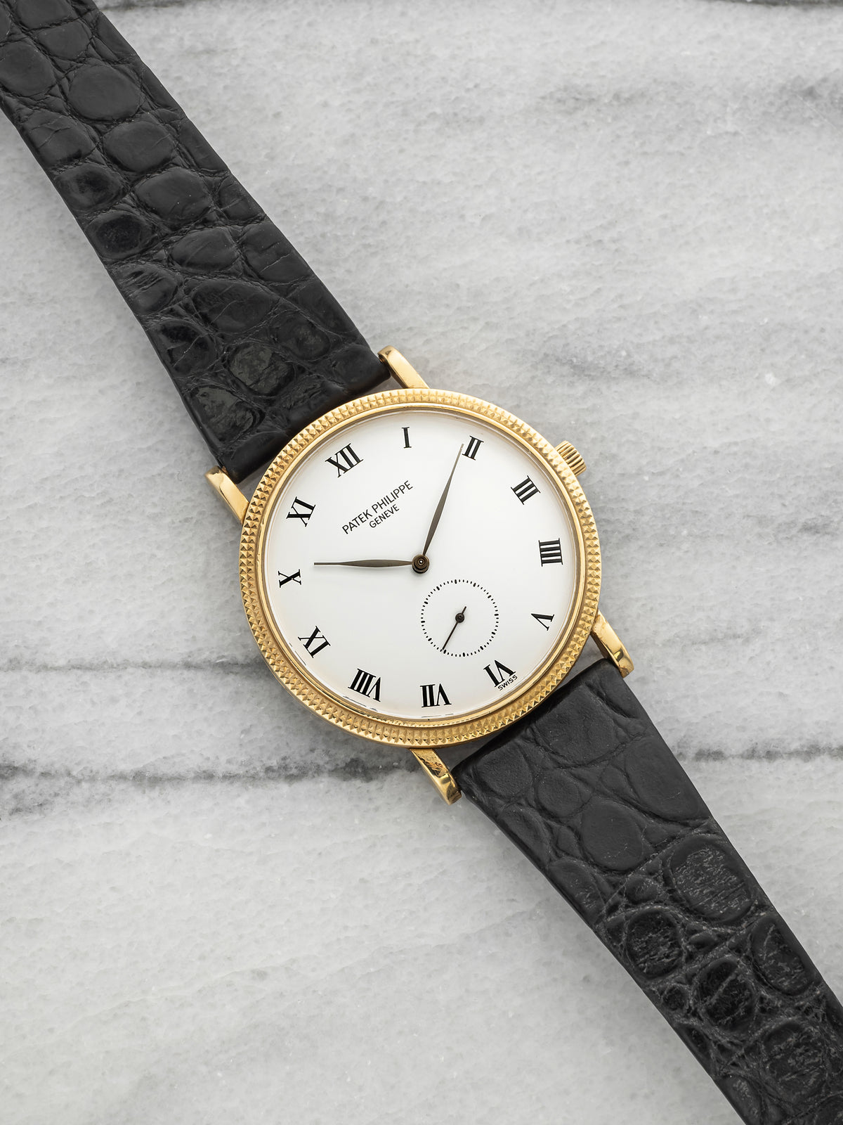 2000s Patek Philippe Calatrava 3919 18K Yellow Gold White Dial Manual 33mm