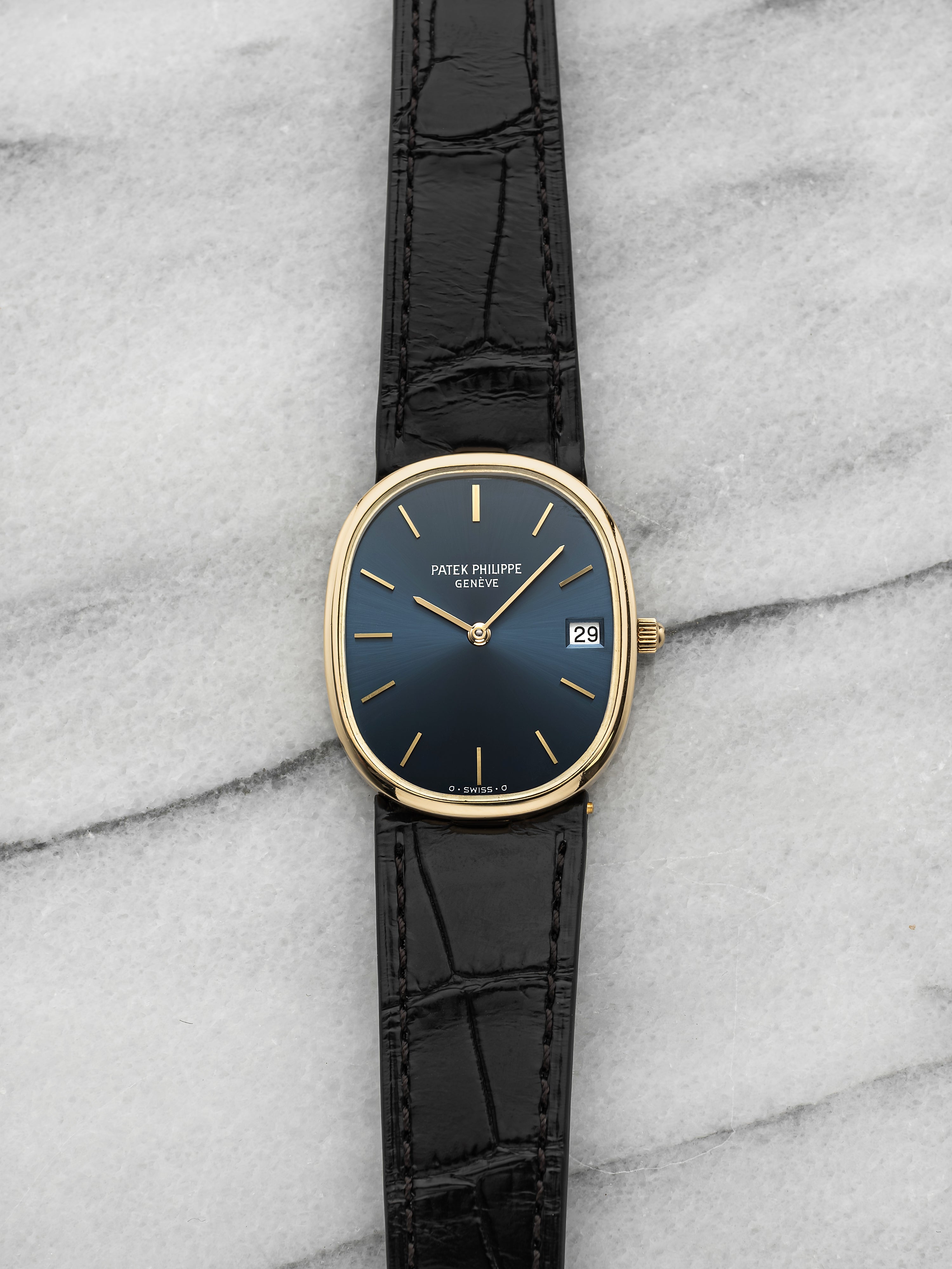 1970s Patek Philippe Ellipse 3548J 18k Yellow Gold Blue Dial Manual 28mm