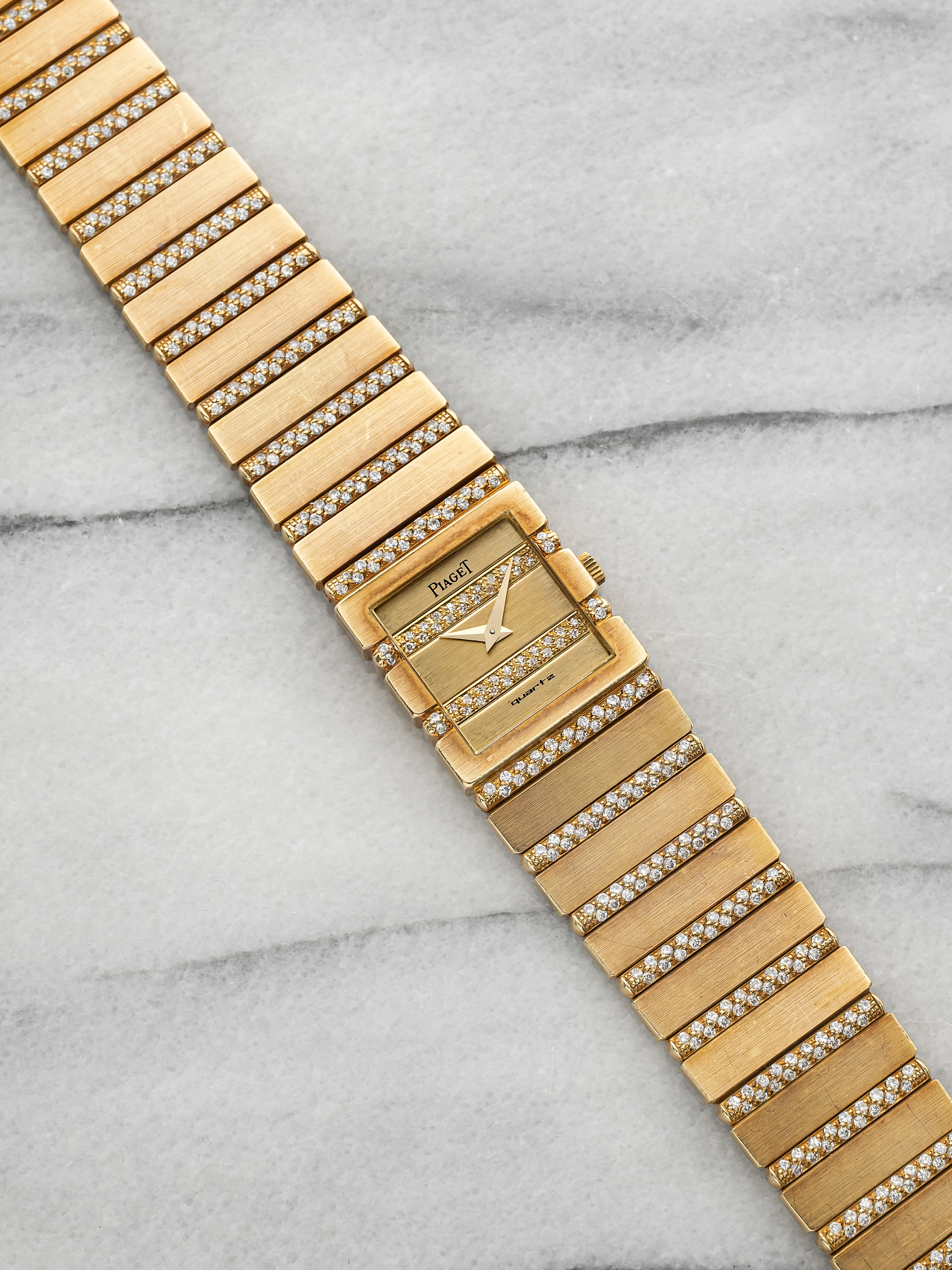 Vintage 1990s Piaget Polo 8131 C705 18K YG Staggered Diamond Dial Quartz 20mm