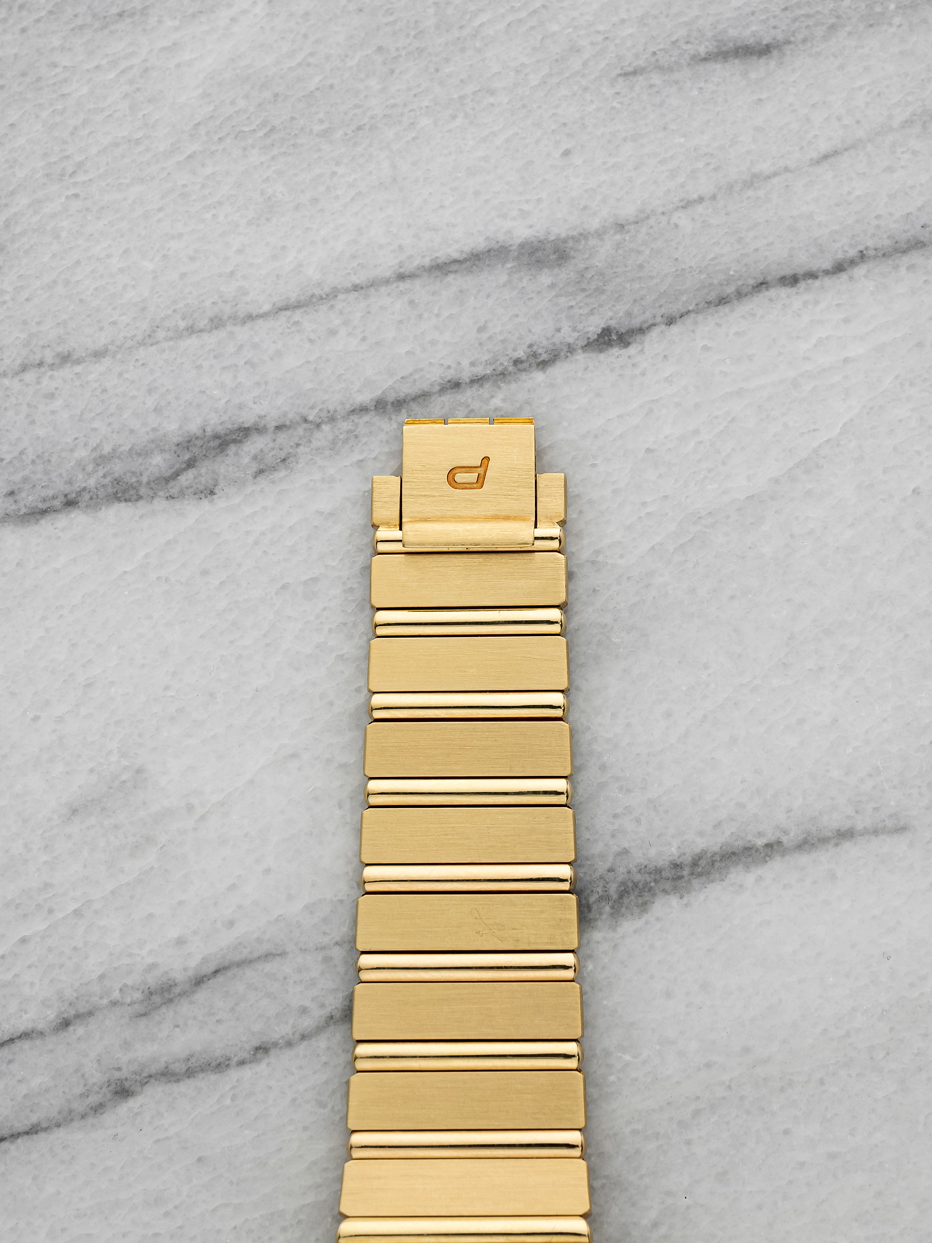 Piaget Polo 7661 C 701 - 18K Yellow Gold & Onyx