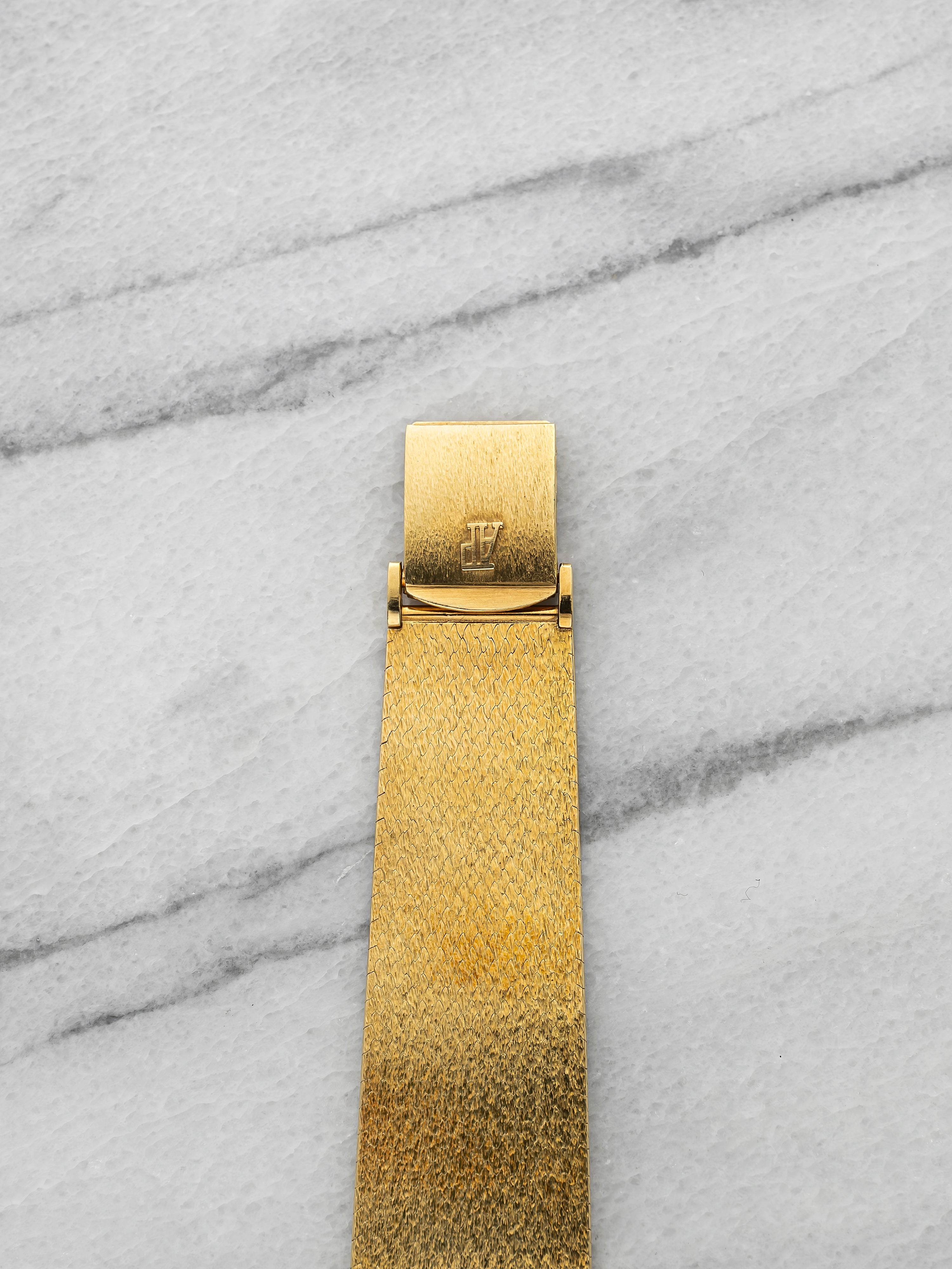 Audemars Piguet Ellipse - 18K Yellow Gold, Champagne Glitter Dial