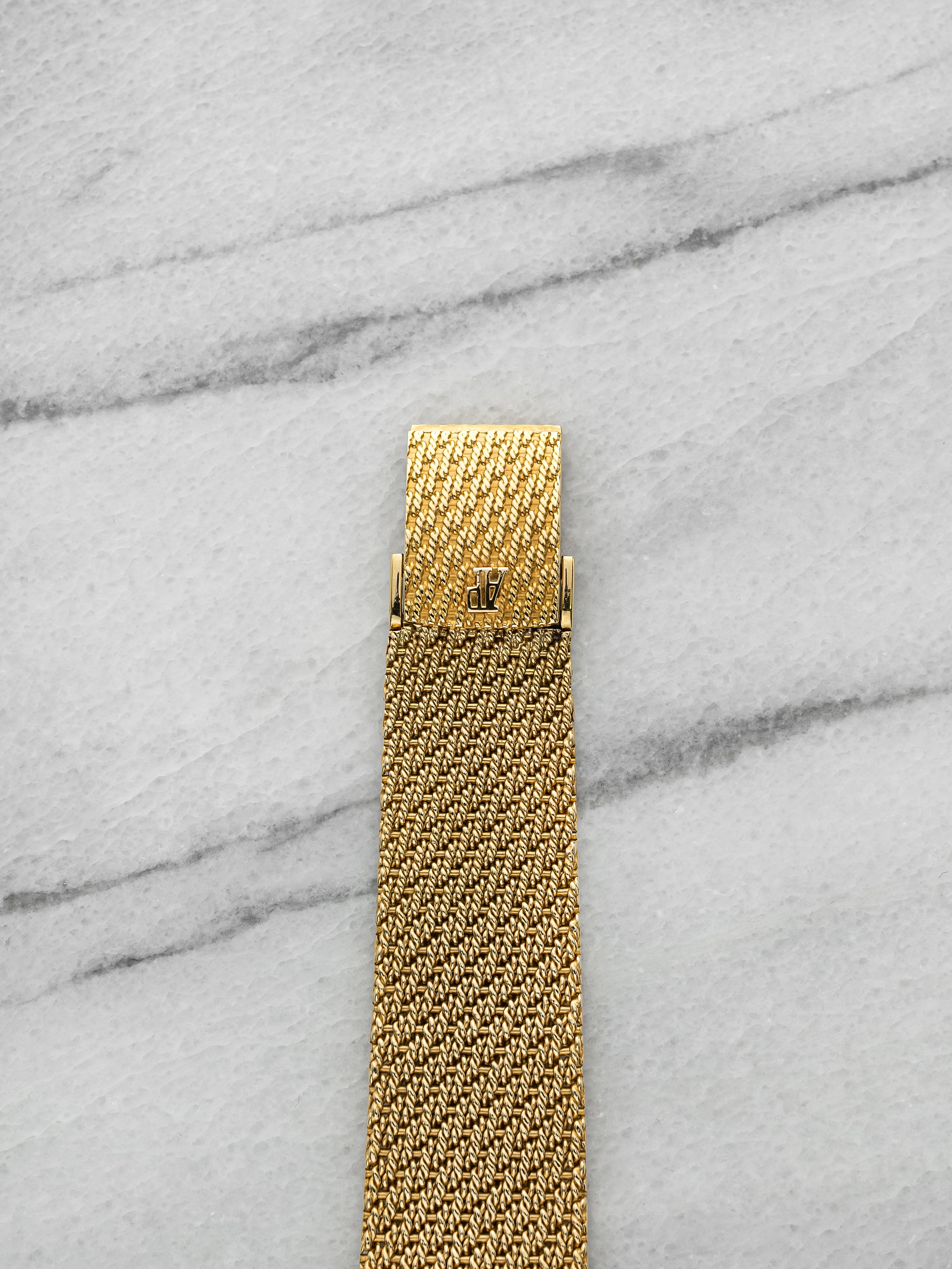 Audemars Piguet Octagonal 18K Yellow Gold Champagne Dial Manual 30x31mm