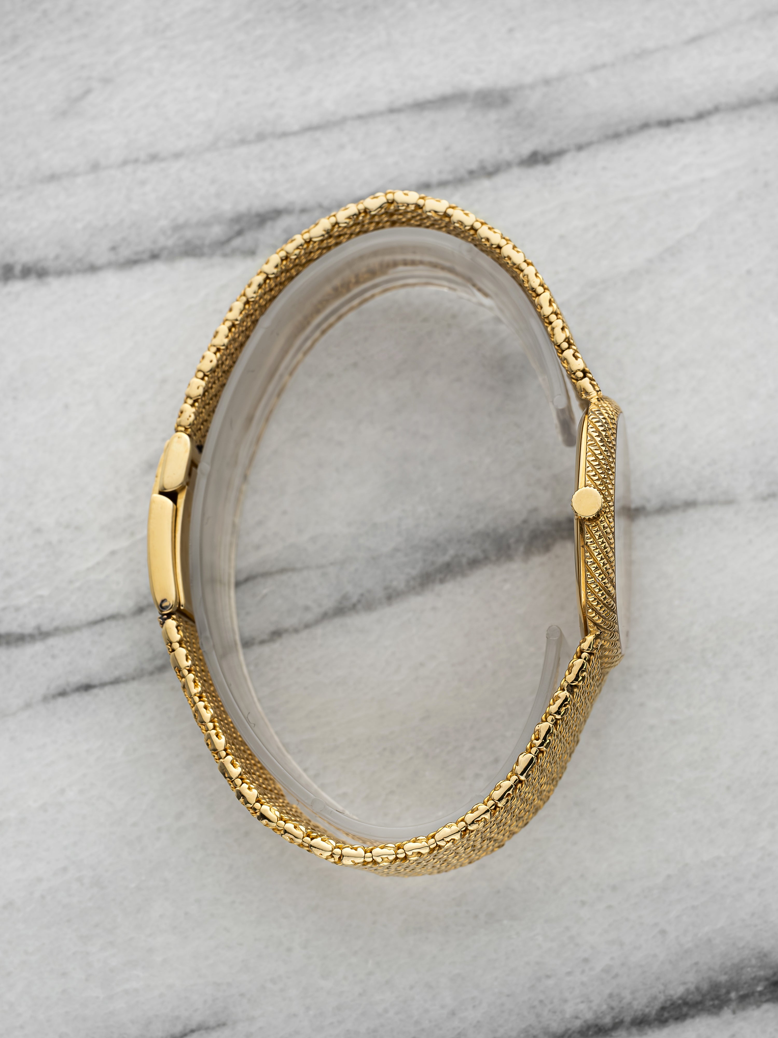 Audemars Piguet Octagonal 18K Yellow Gold Champagne Dial Manual 30x31mm