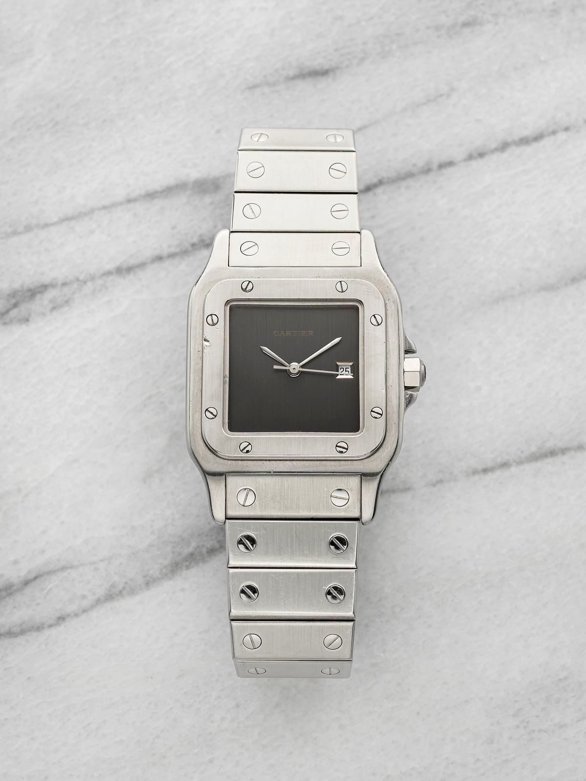 Steel Santos Carrée 2960 with the slate-grey dial, logo and date only, on the steel bracelet. · Photo: Danny's Vintage Watches · © Danny's Vintage Watches, used with permission · Source: https://dannysvintagewatches.com/products/cartier-santos-carree-2960-stainless-steel-ghost-dial