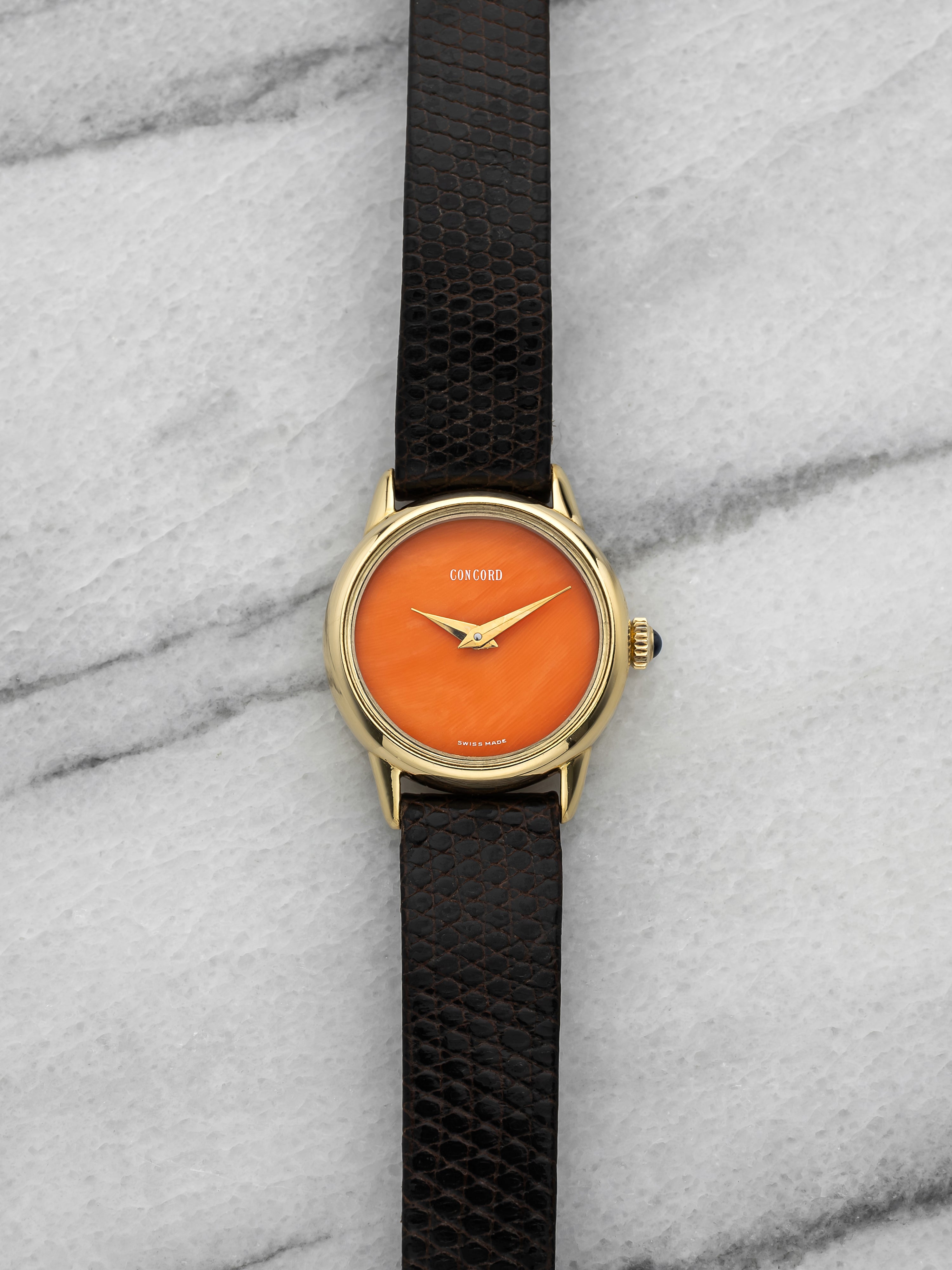 Vintage 1980s Concord Dress 508920 18K Yellow Gold Coral Dial Manual 23 mm