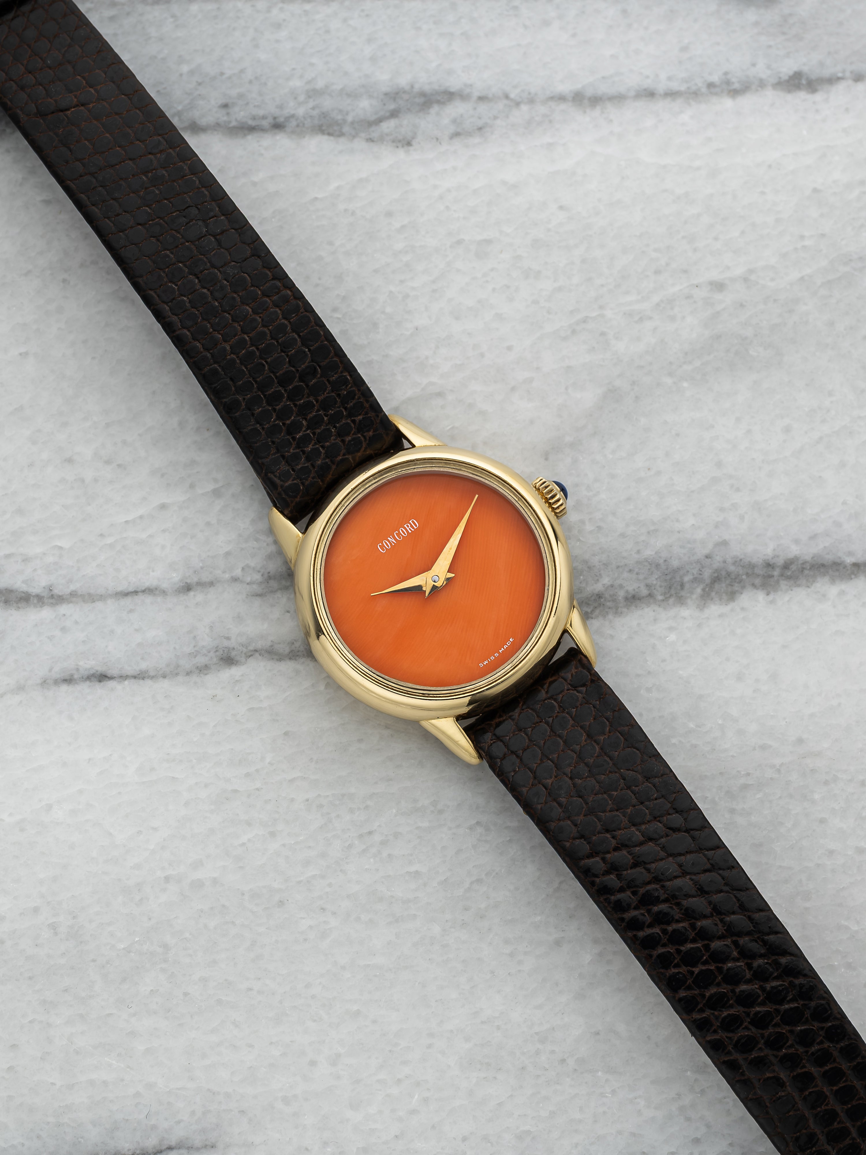 Vintage 1980s Concord Dress 508920 18K Yellow Gold Coral Dial Manual 23 mm