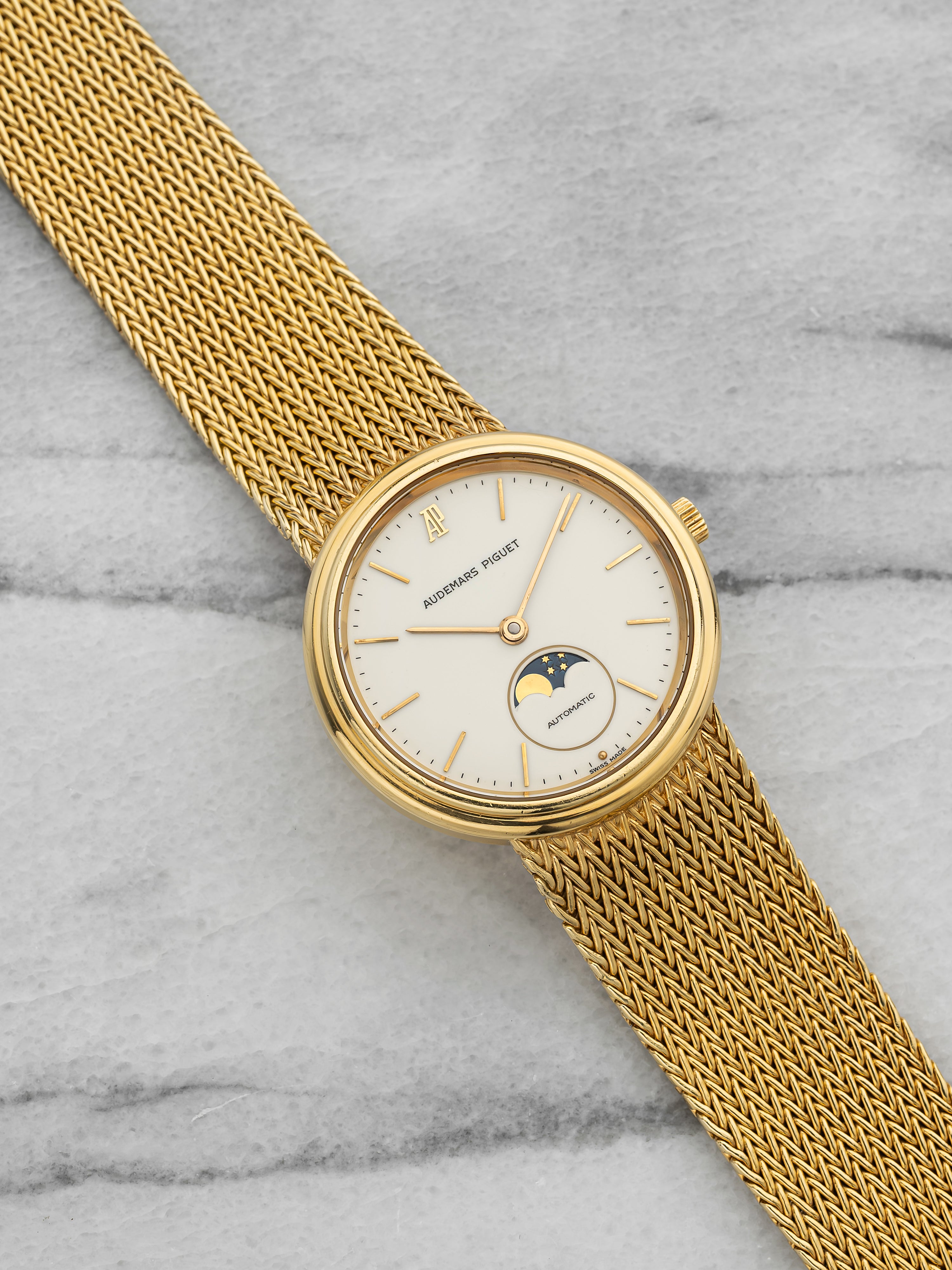 1980s Audemars Piguet Ultra Thin Moonphase 18K YG White Dial Auto 33 mm