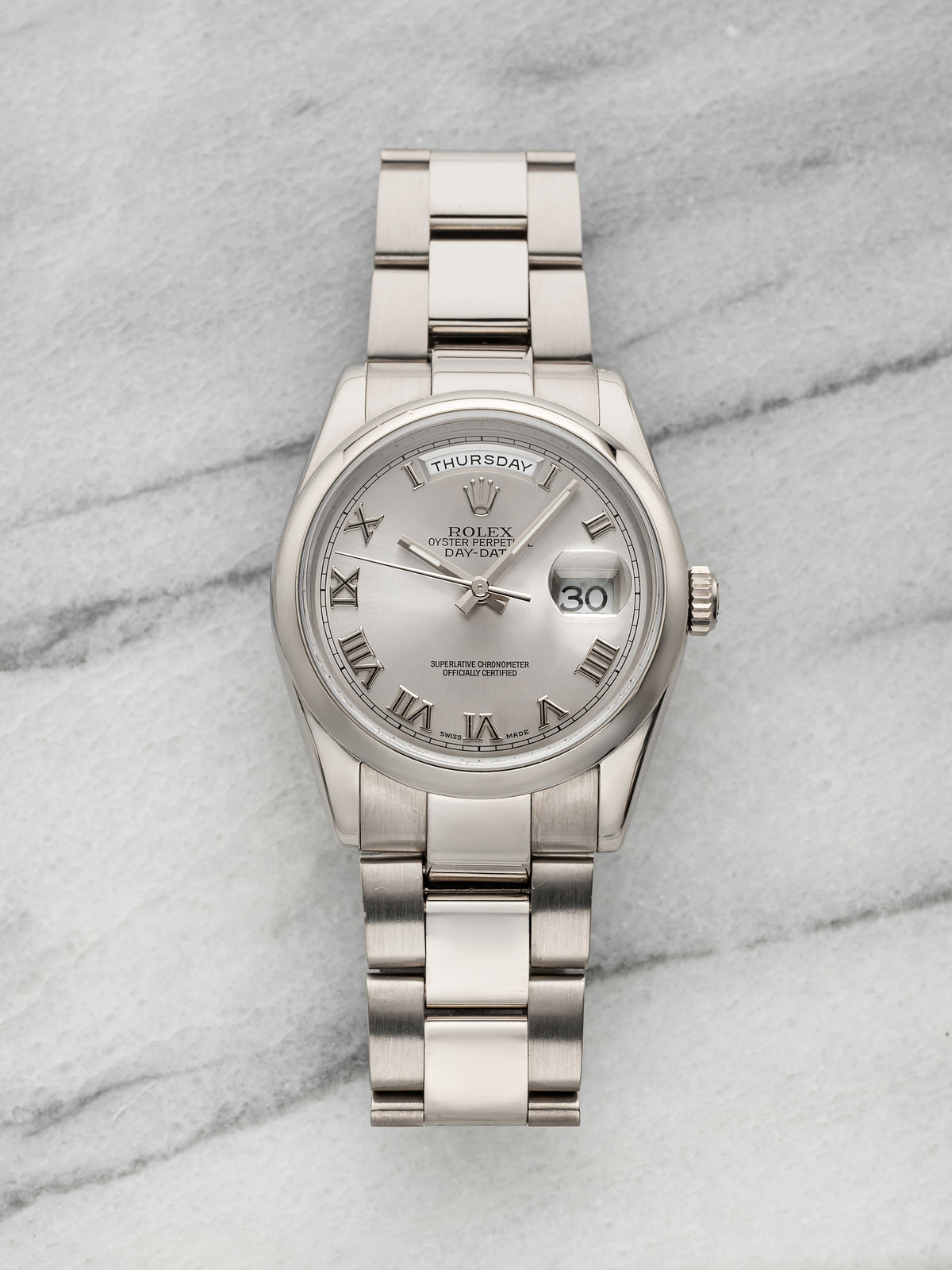 2002 Rolex Day-Date 118209 18K White Gold Silver Roman Dial Automatic 36mm