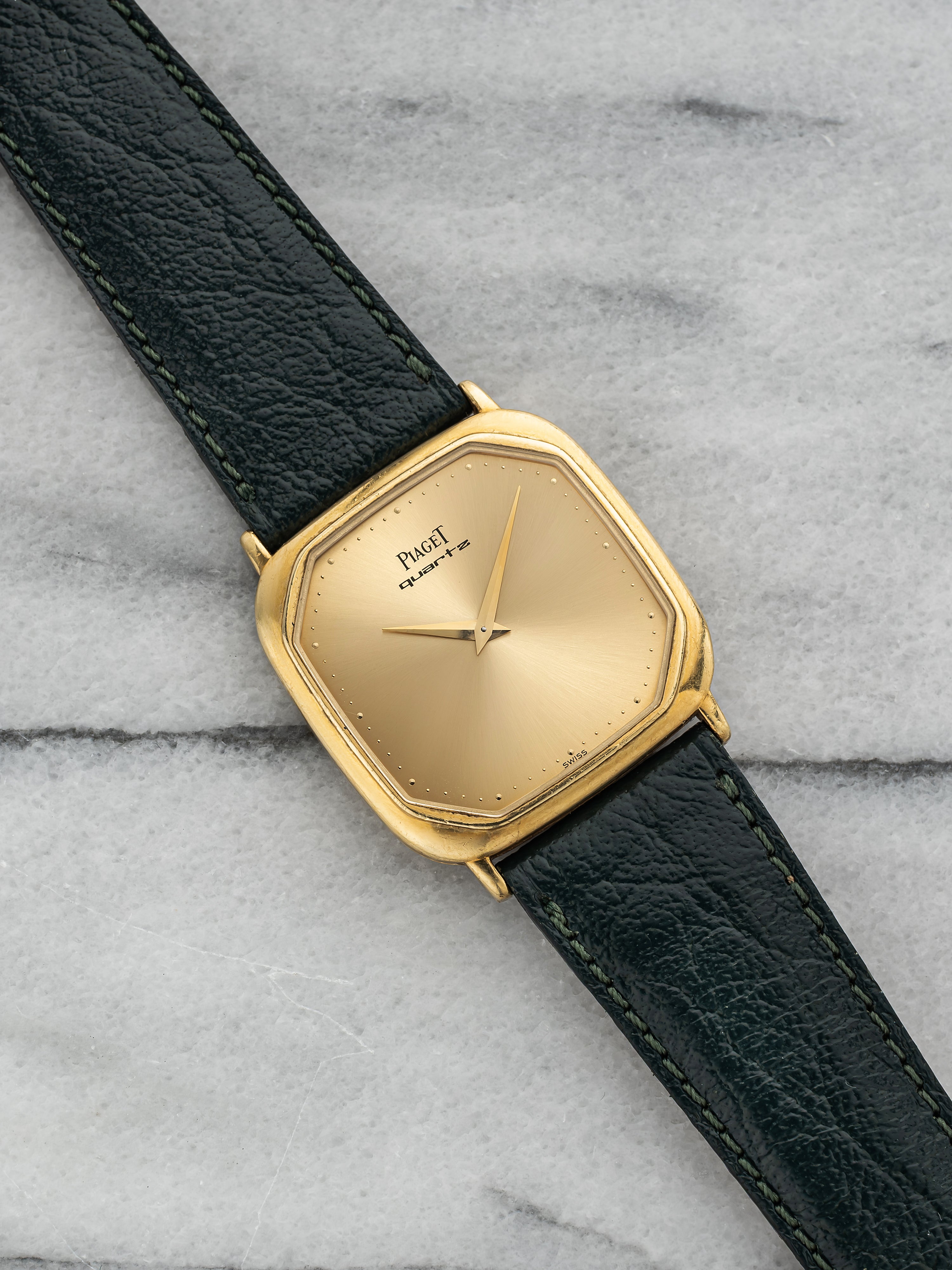 Piaget Polo 7702 – 18k Yellow Gold, Champagne Sunburst Dial