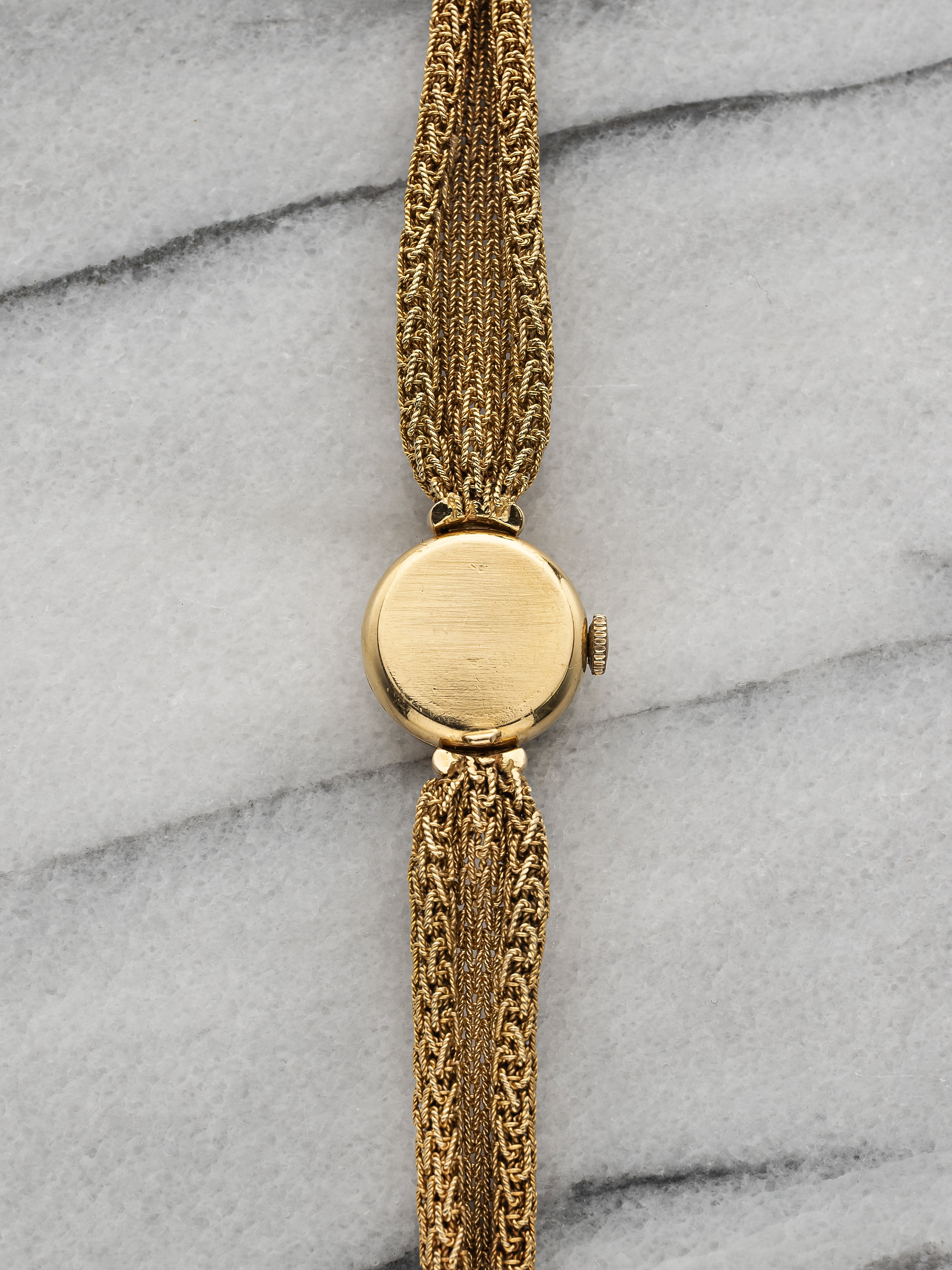 Rolex Ladies Integrated Bracelet – 18K Gold Patina White Dial