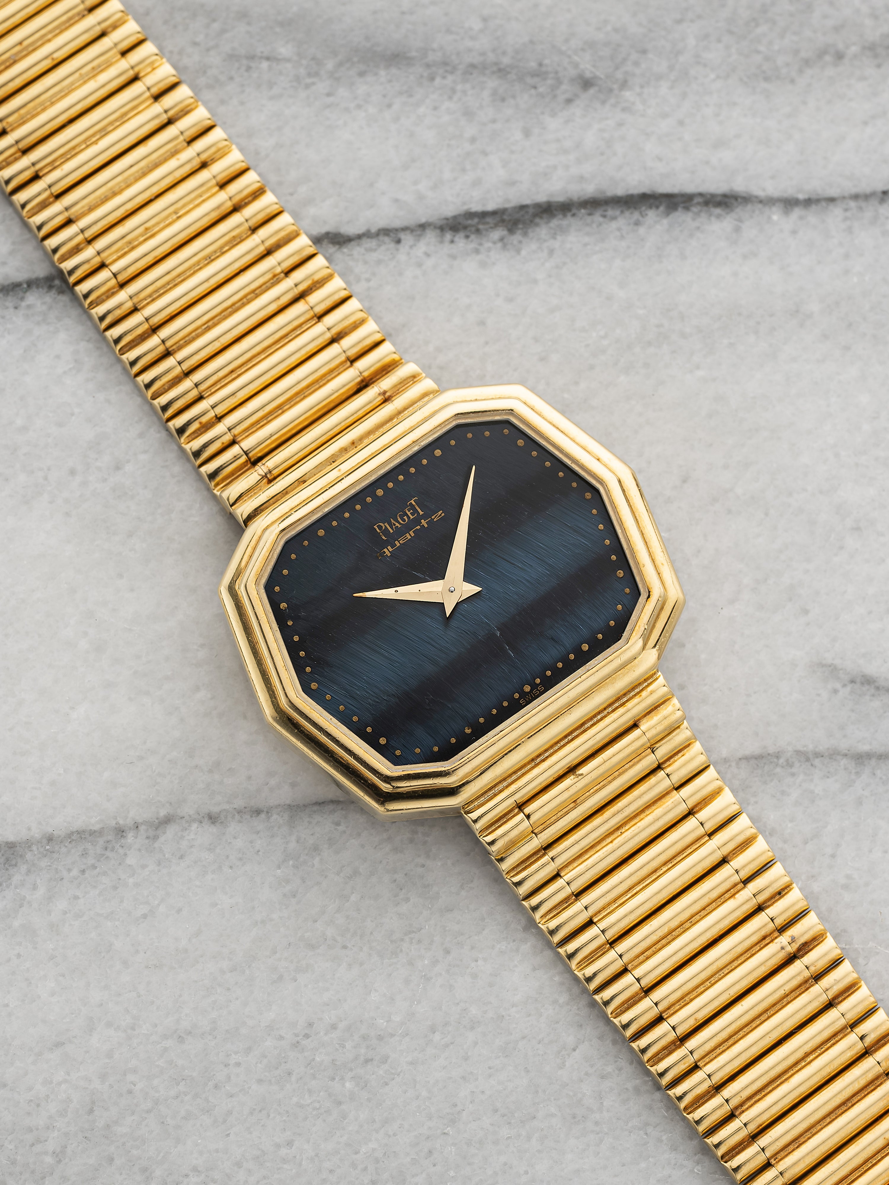Piaget 75608 – 18K Yellow Gold Hawkeye Stone Dial