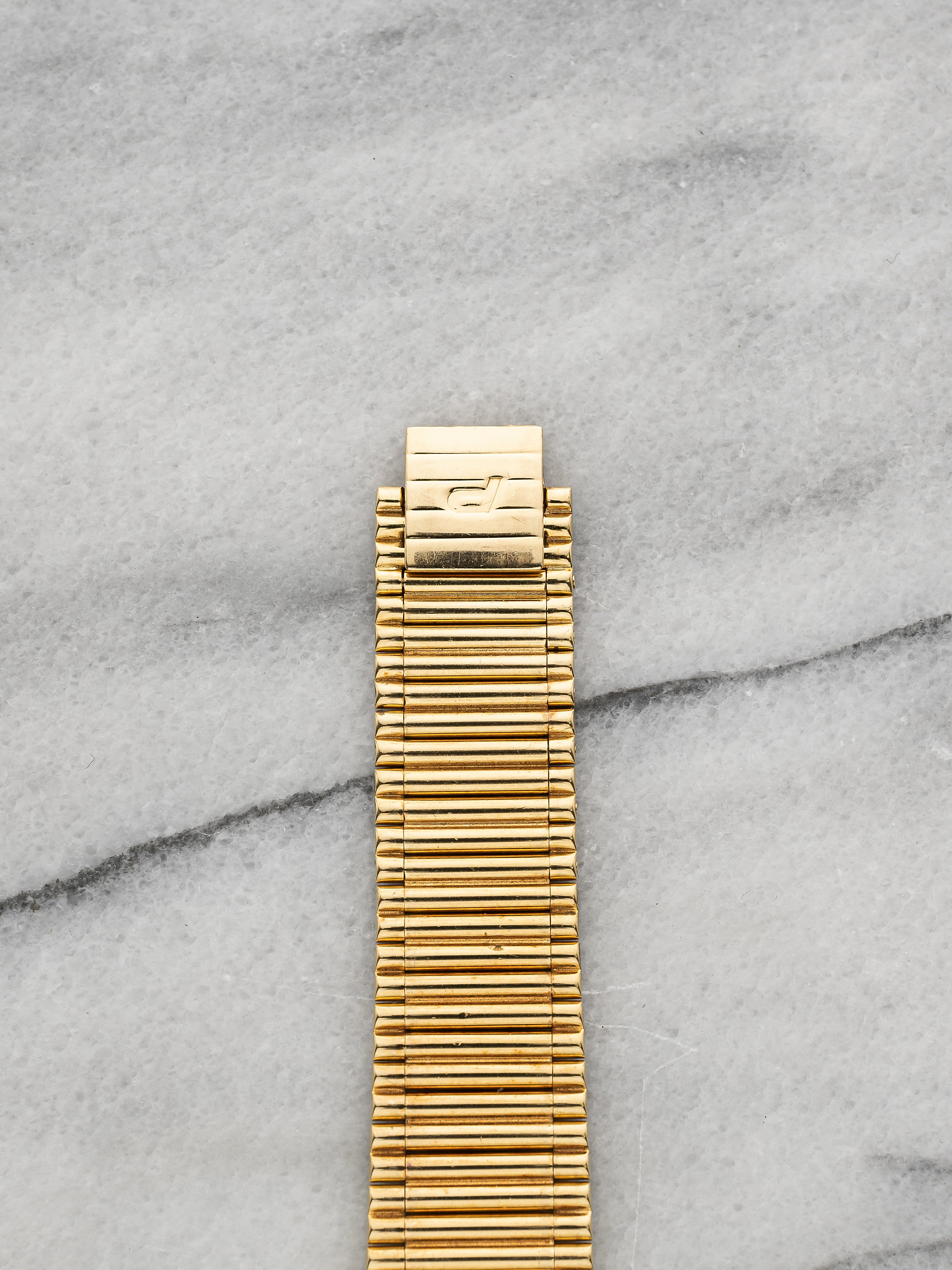 Piaget 75608 – 18K Gold Hawkeye Stone Dial