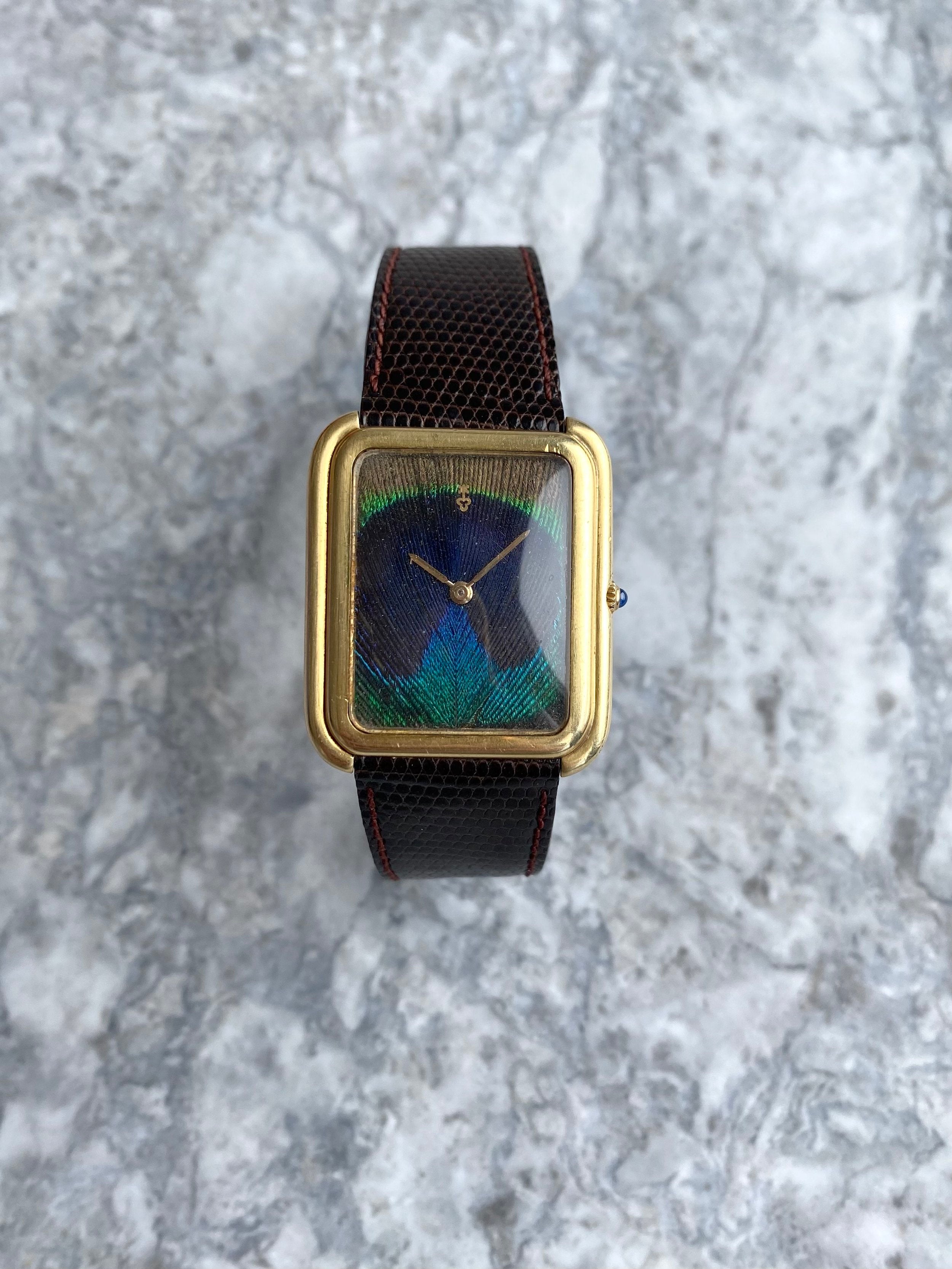 Corum 18K Gold - Peacock.