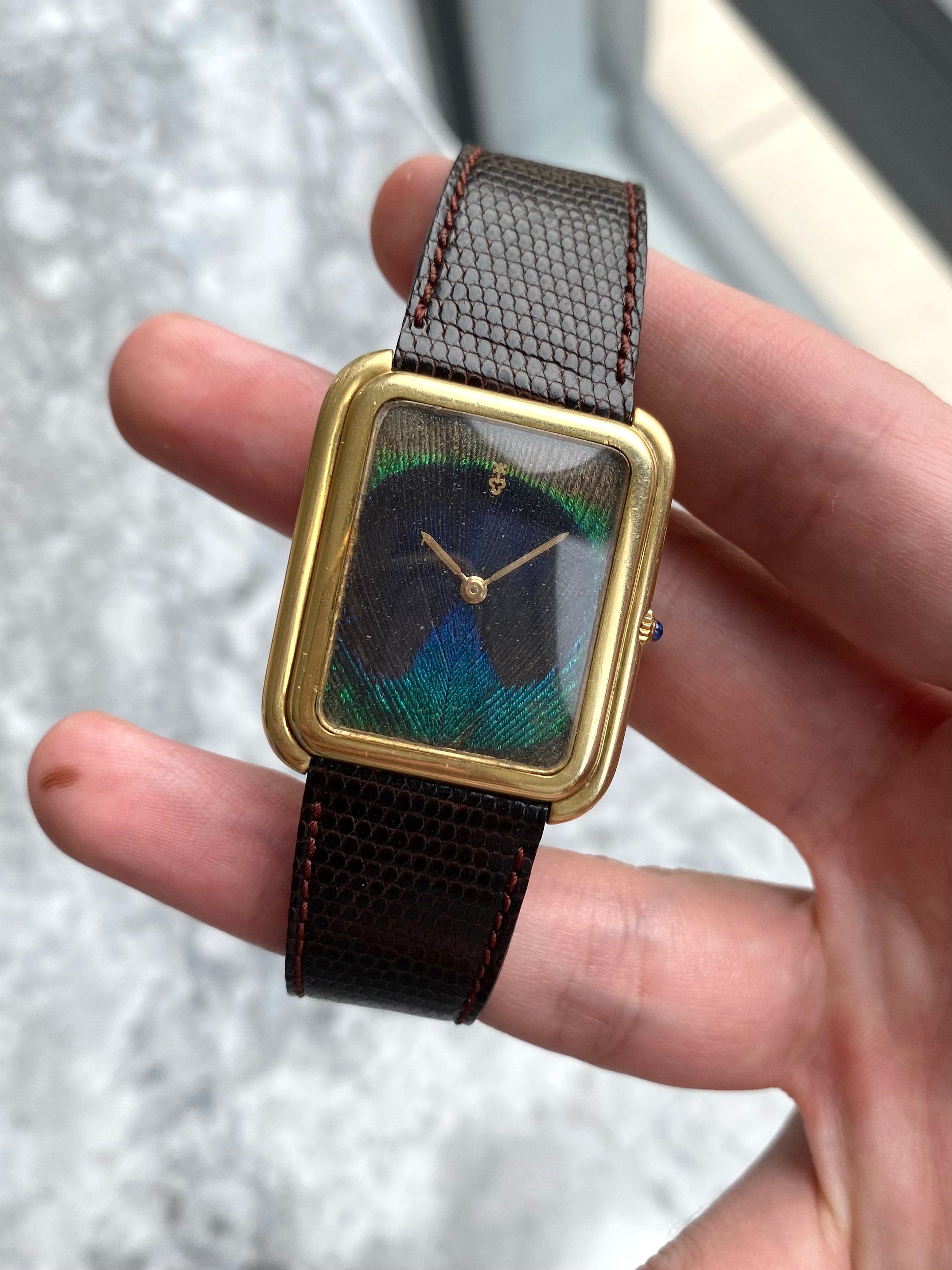 Corum 18K Gold - Peacock.