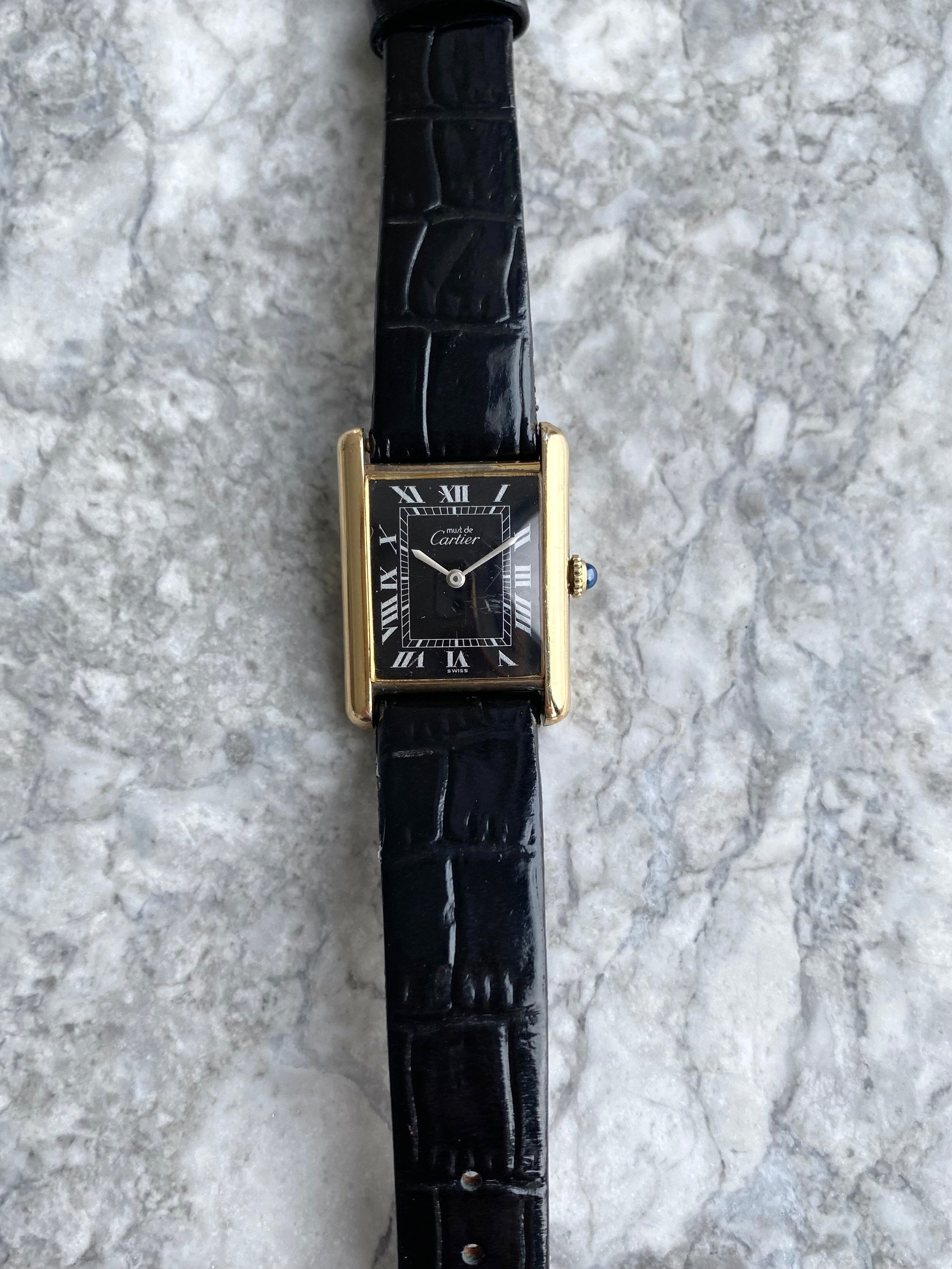 Must de Cartier Tank - Black Roman numerals.