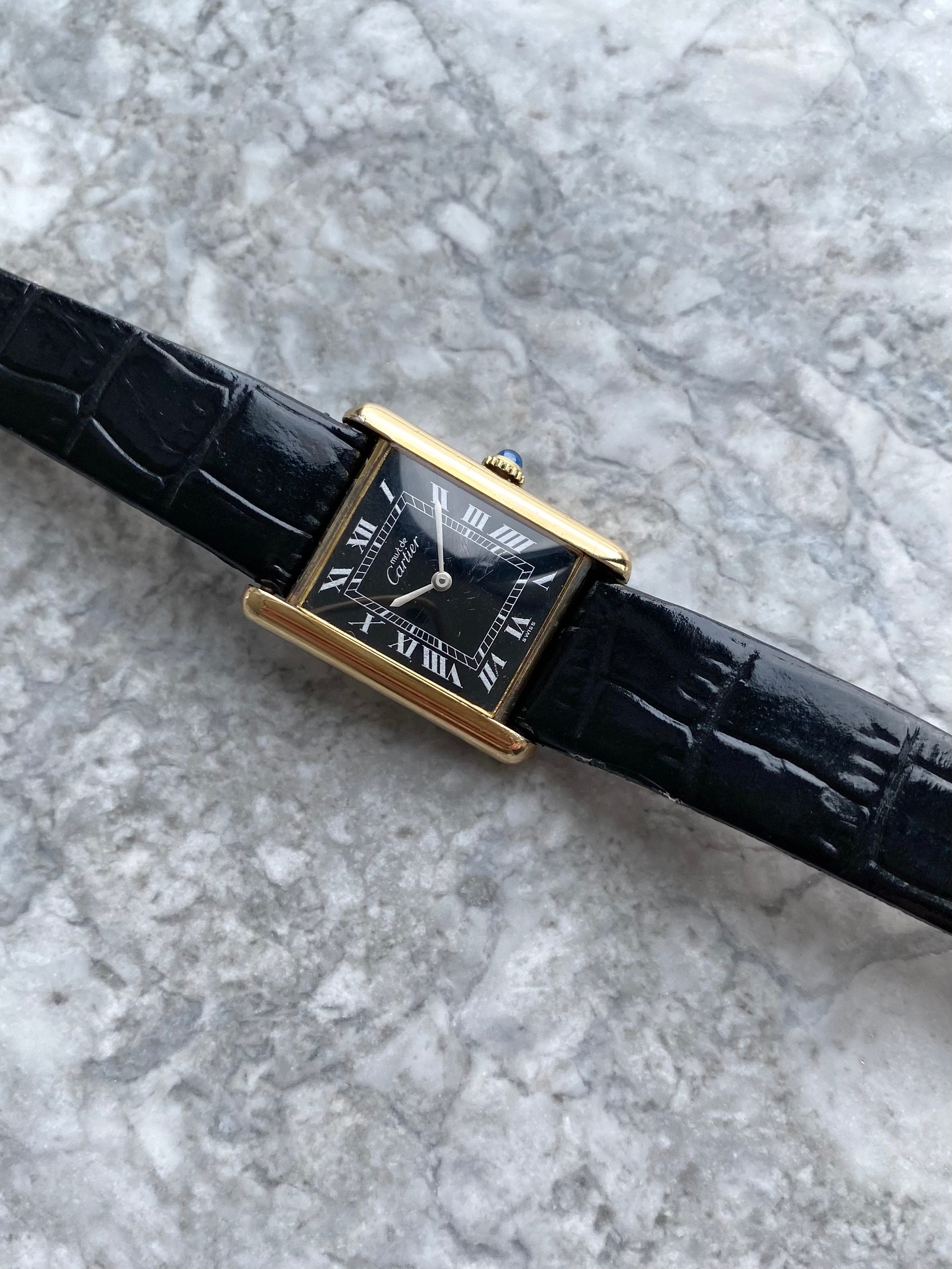 Must de Cartier Tank - Black Roman numerals.