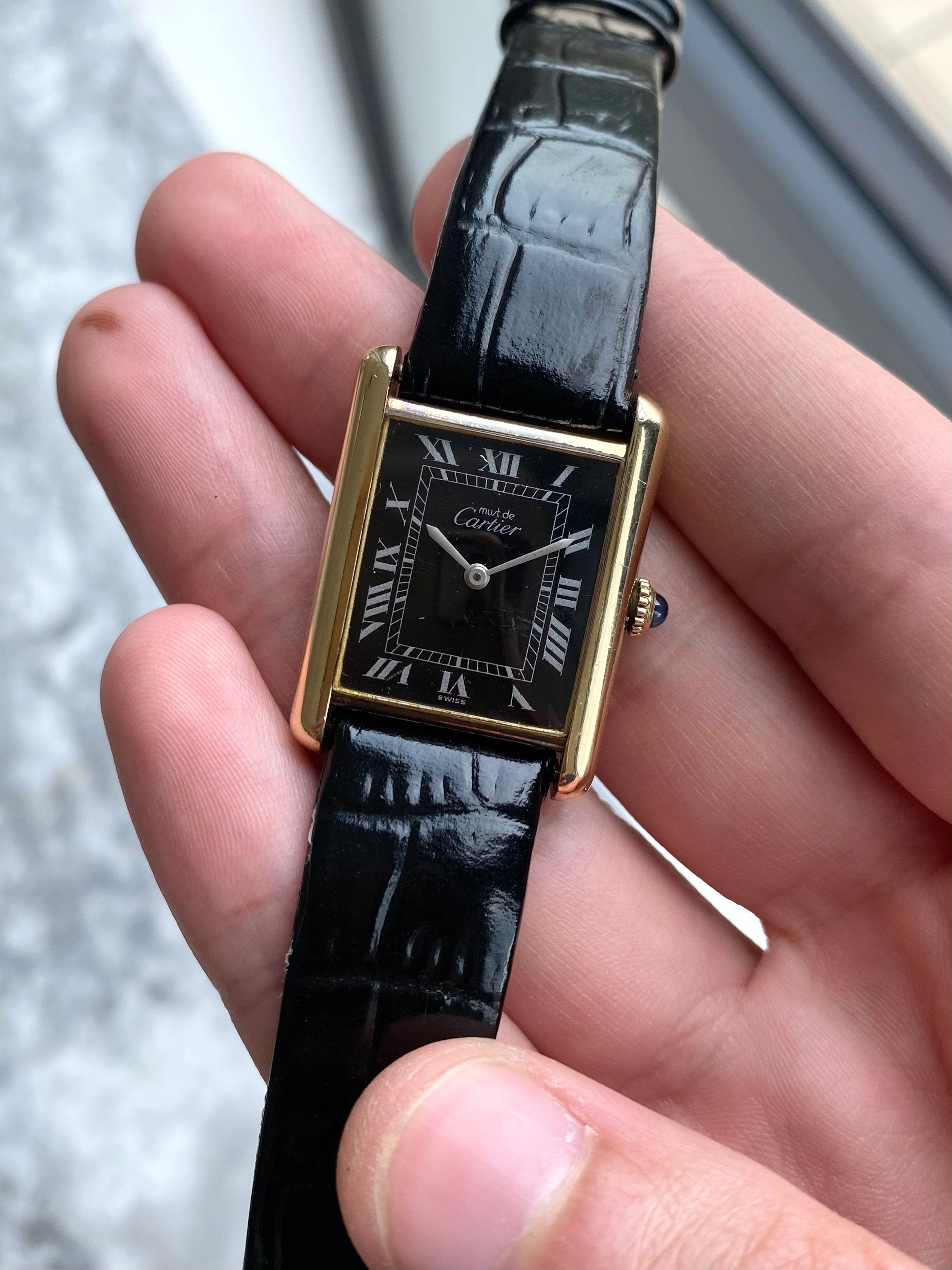 Must de Cartier Tank - Black Roman numerals.