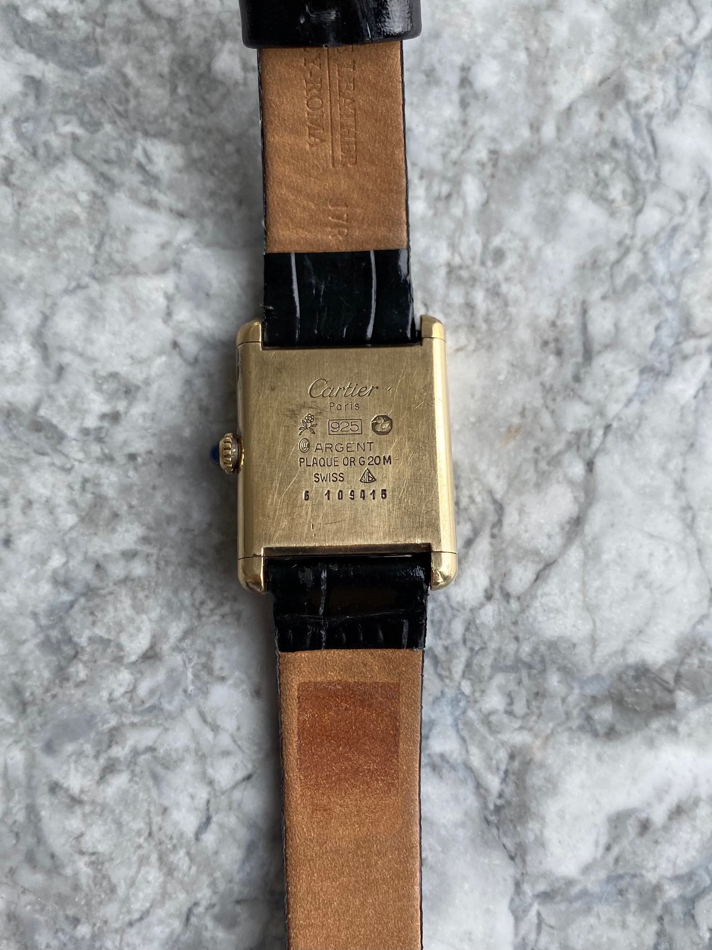 Must de Cartier Tank - Black Roman numerals.