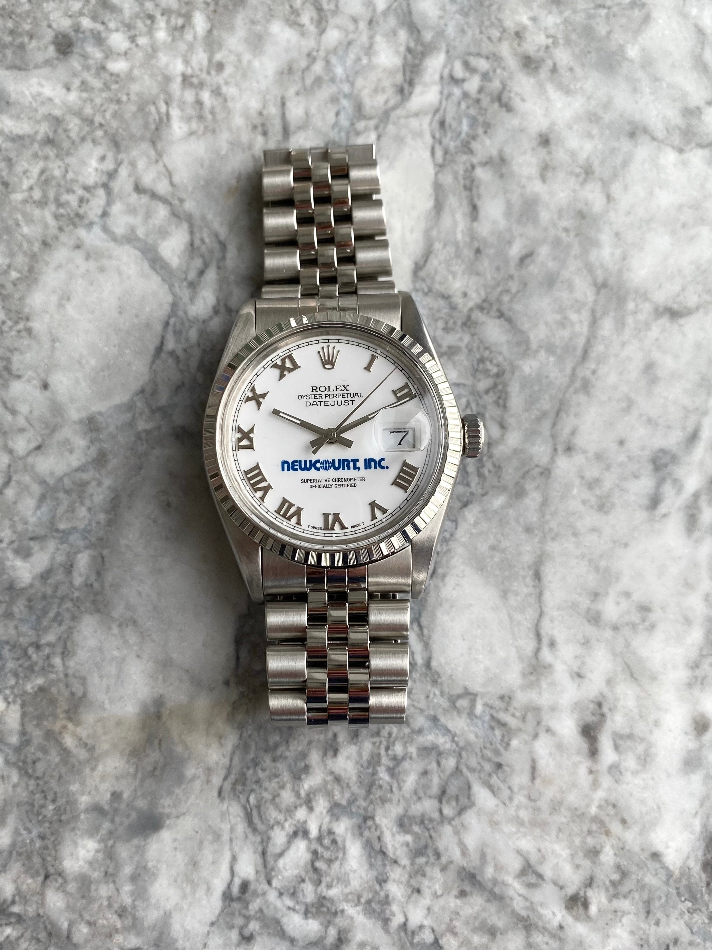 Rolex Datejust 16220 - Newcourt White Roman.