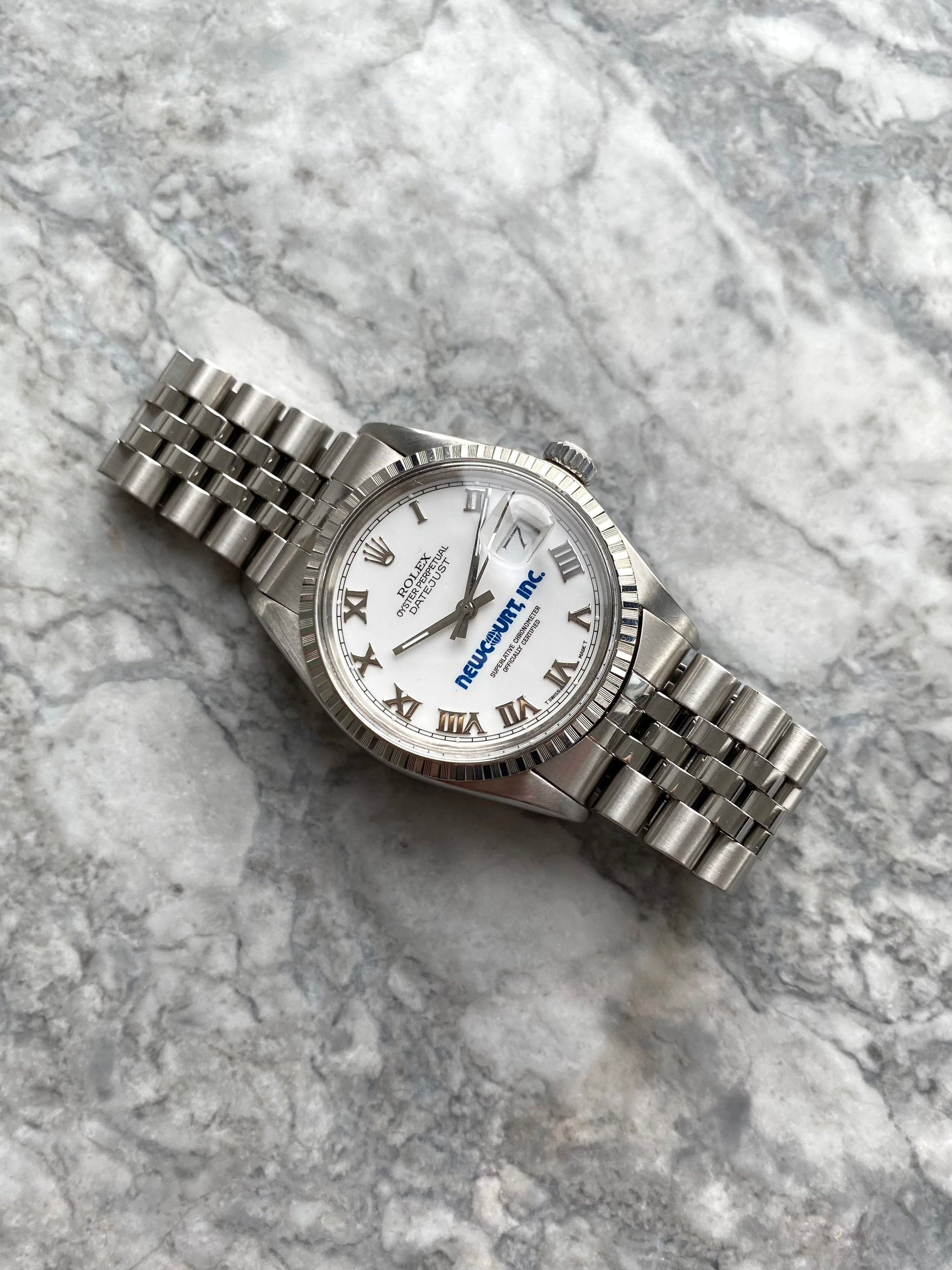 Rolex Datejust 16220 - Newcourt White Roman.