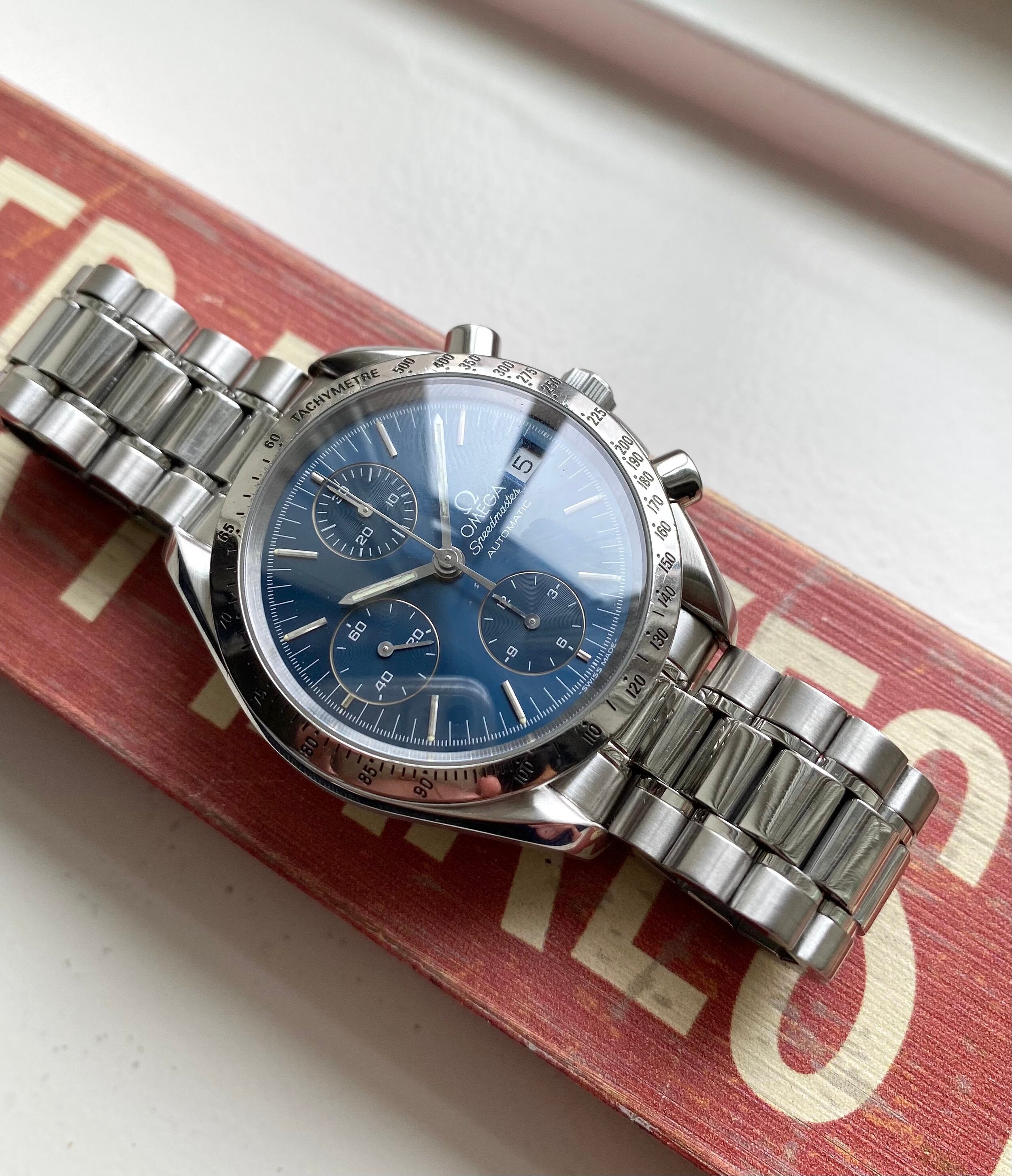 Omega speedmaster blue dial best sale