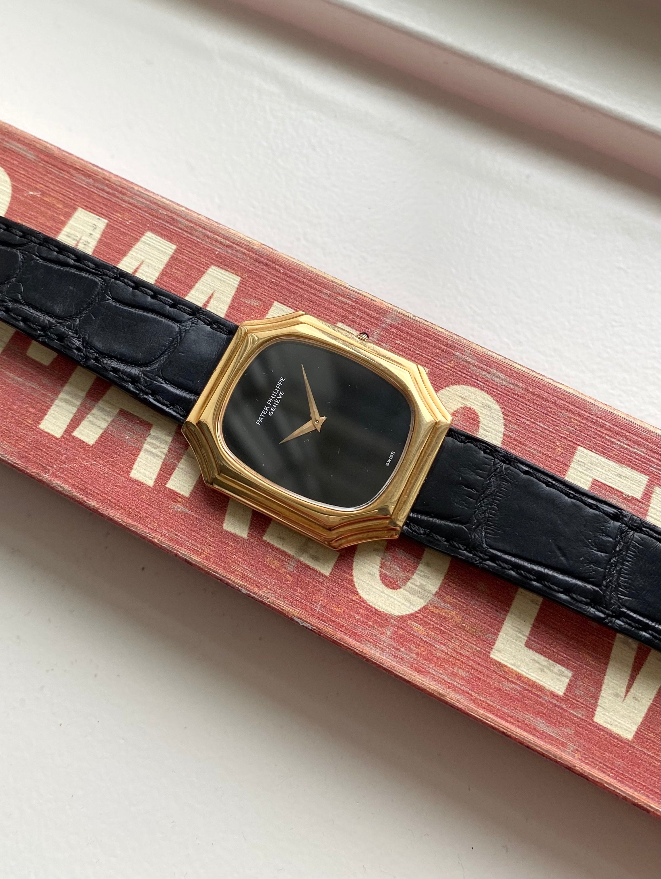 Patek Philippe — 18k Gold Black Onyx Dial