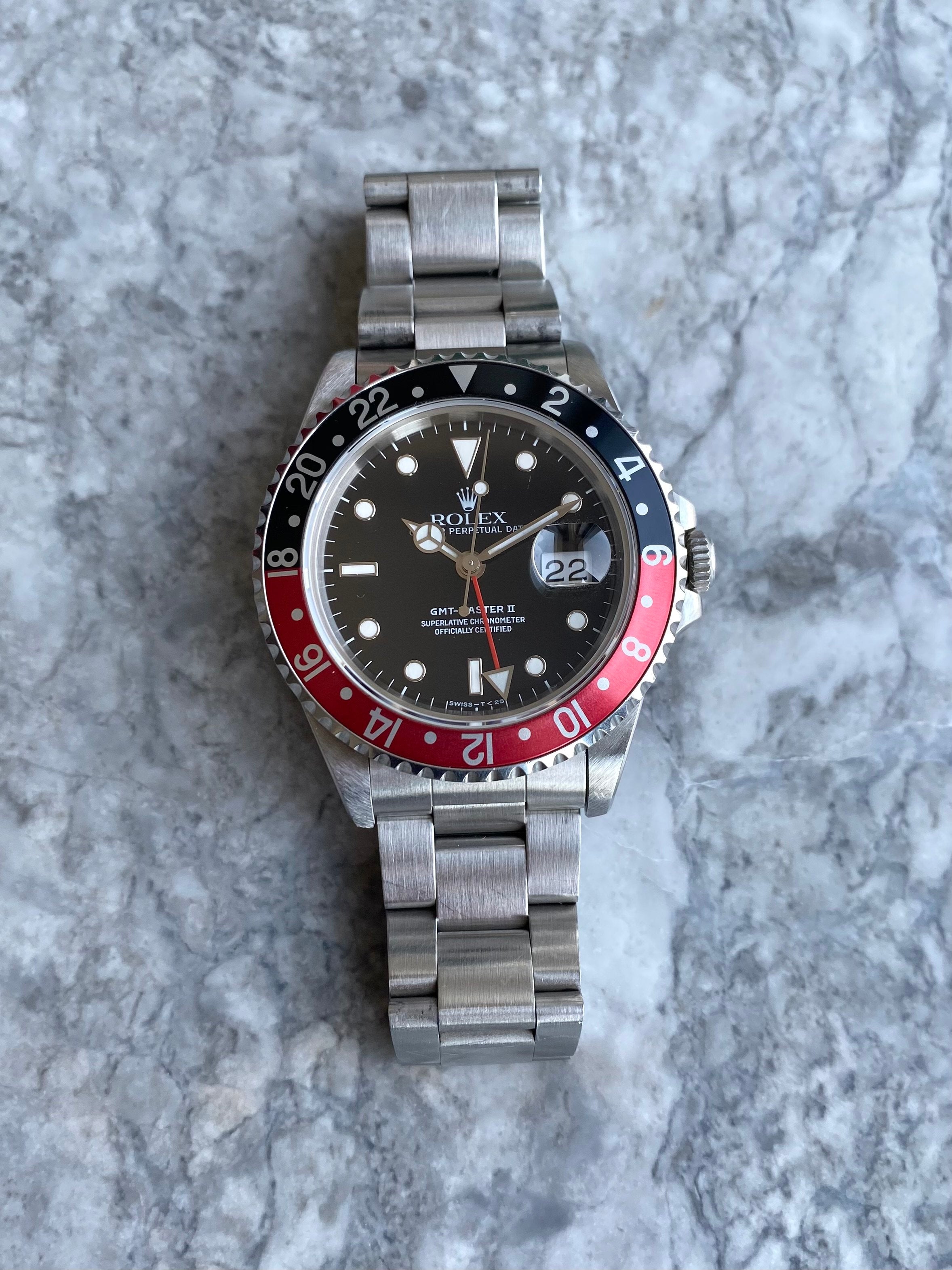 Rolex GMT 16710 - “Coke”.