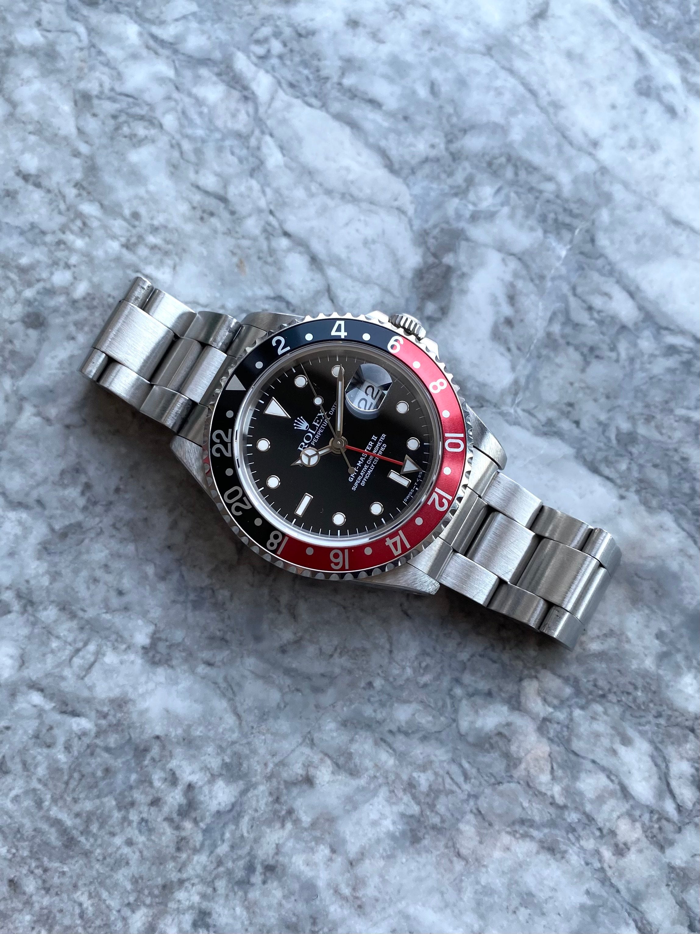 Rolex GMT 16710 - “Coke”.