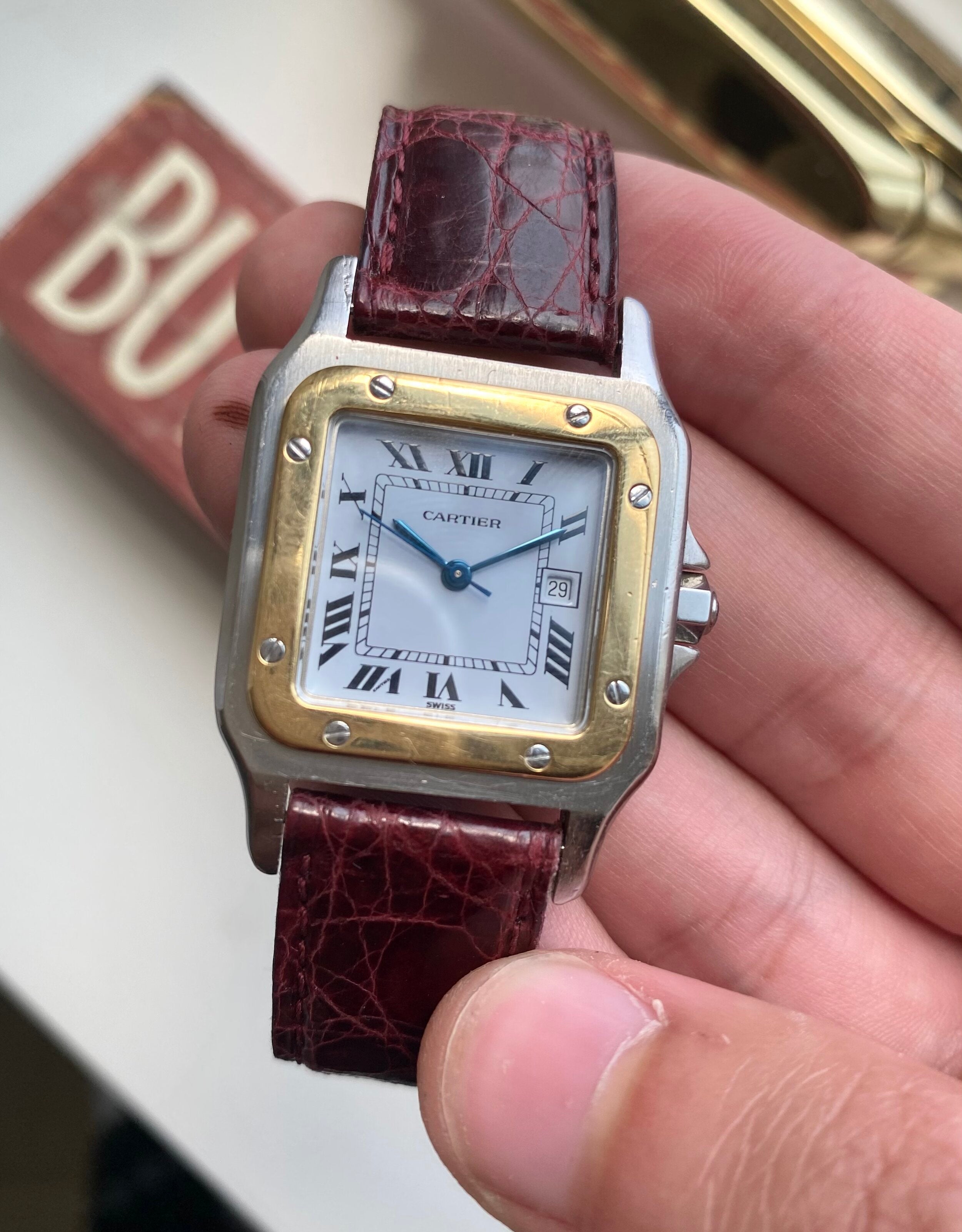 Cartier Santos — Two-tone Black Roman Numeral Dial