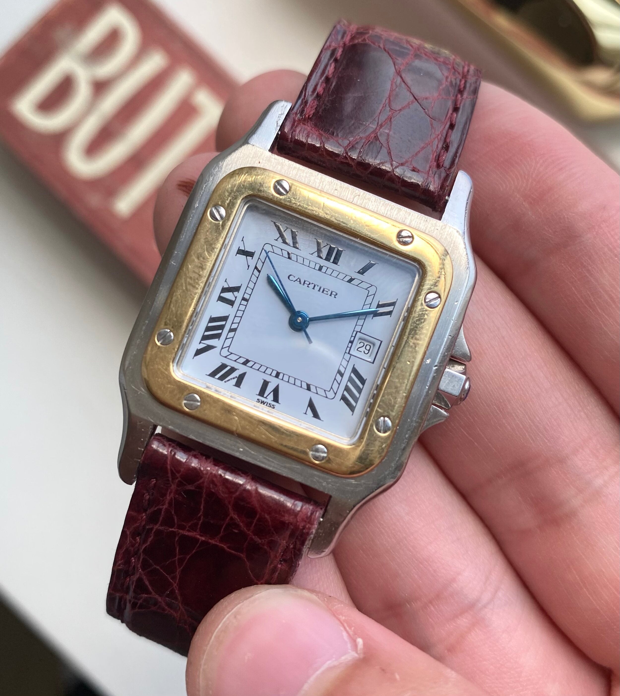 Cartier Santos — Two-tone Black Roman Numeral Dial