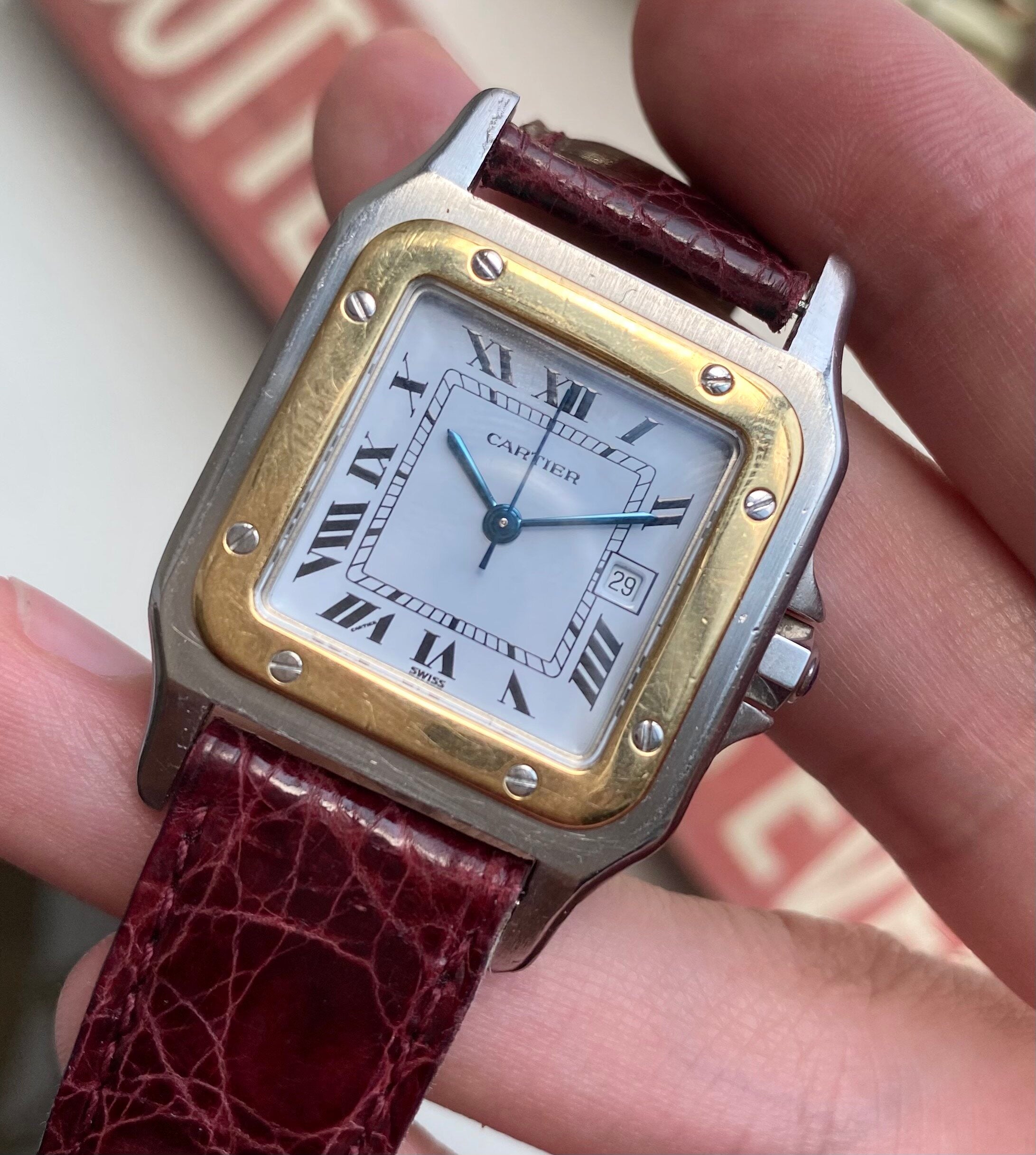 Cartier Santos — Two-tone Black Roman Numeral Dial