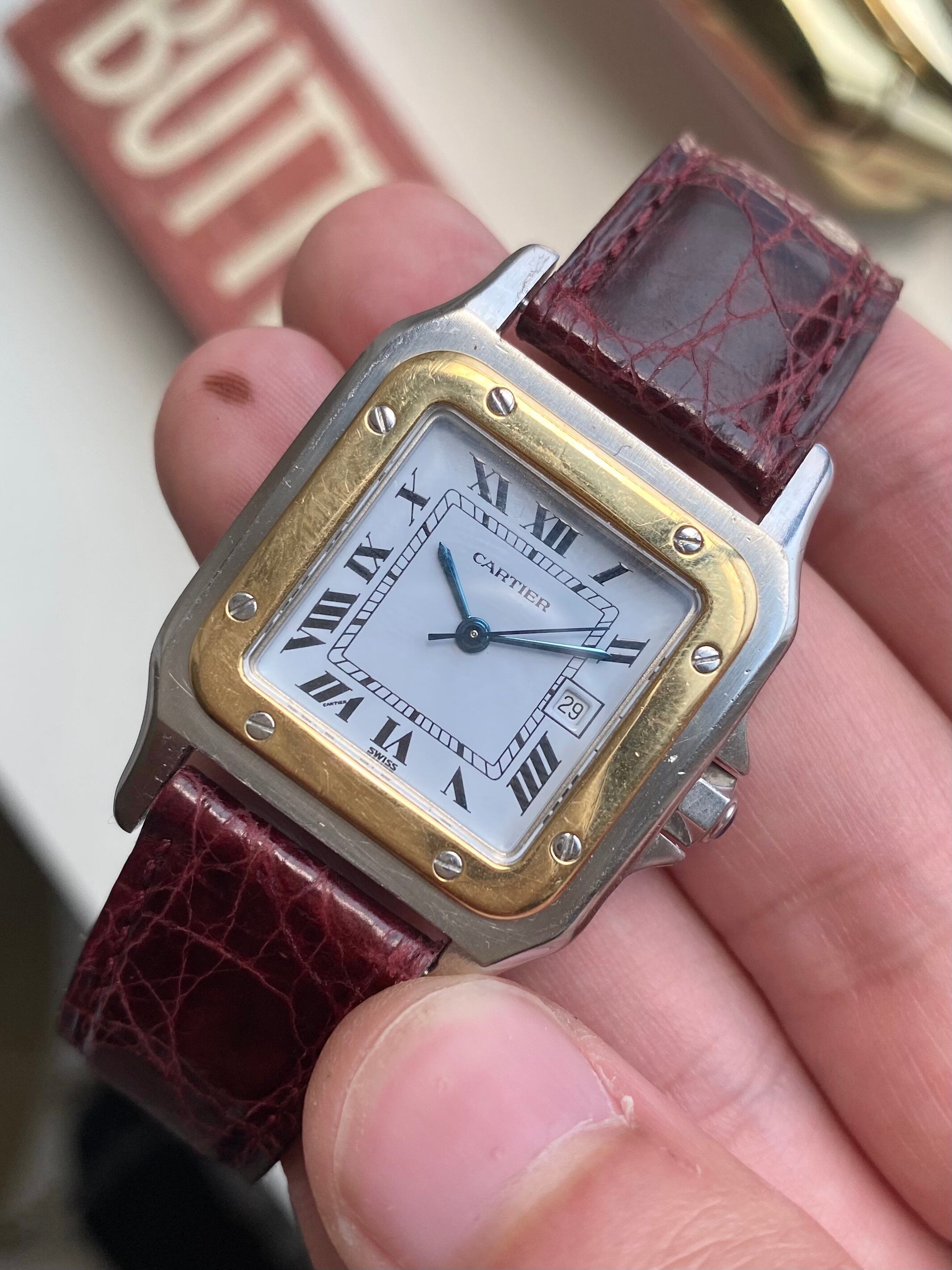 Cartier Santos — Two-tone Black Roman Numeral Dial