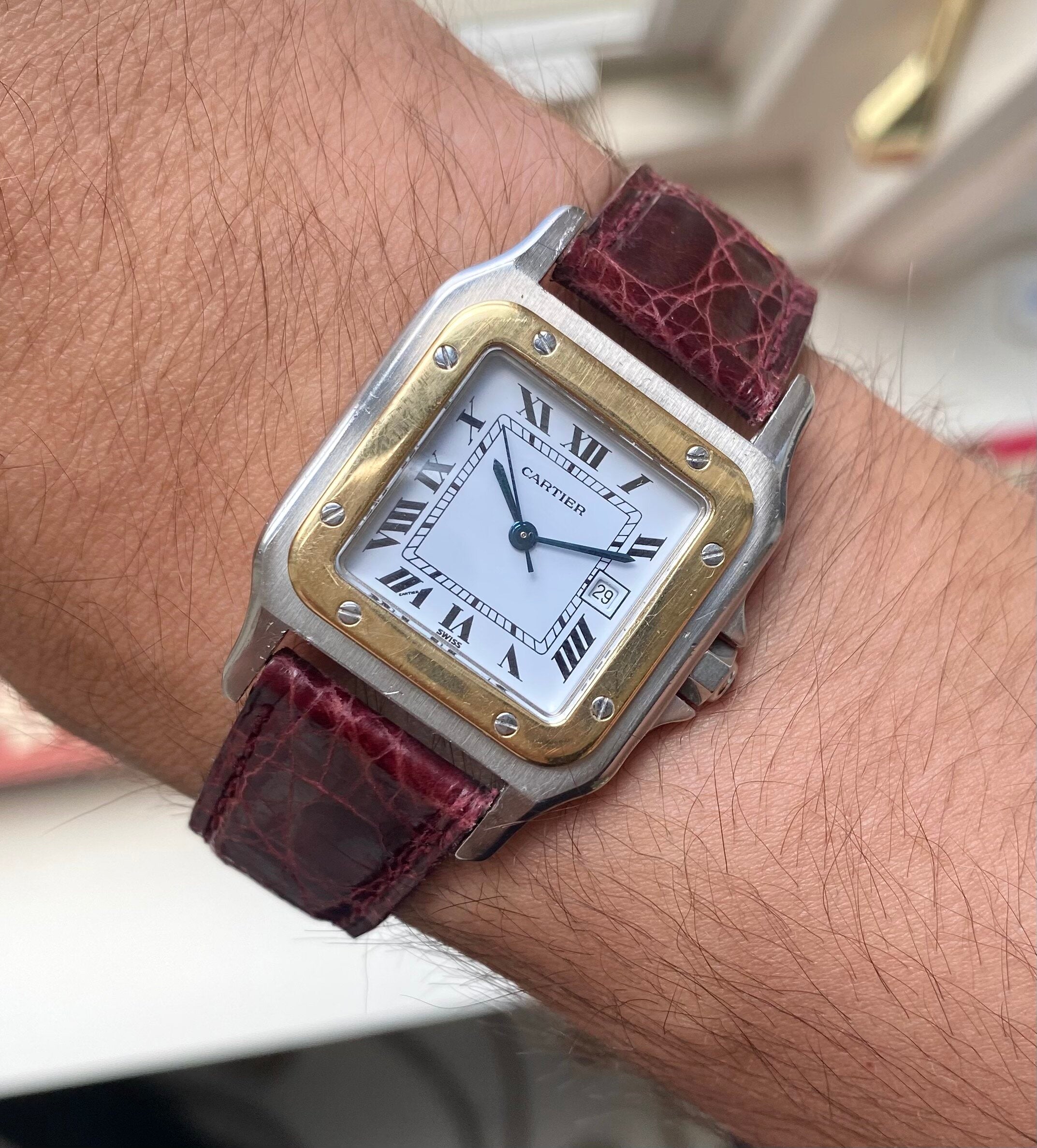 Cartier Santos — Two-tone Black Roman Numeral Dial