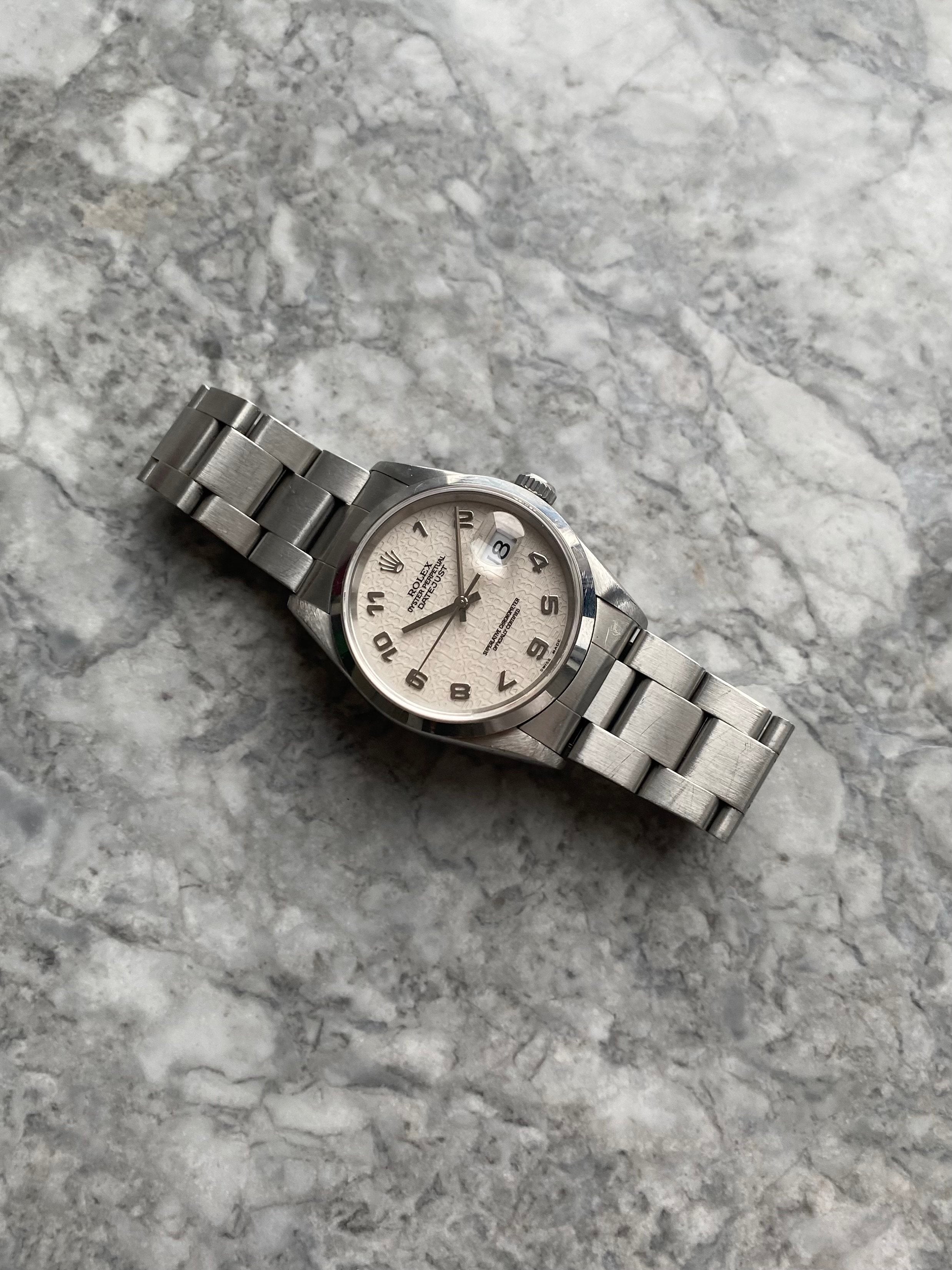 Rolex Datejust 16200 - Silver “Jubilee” Dial.