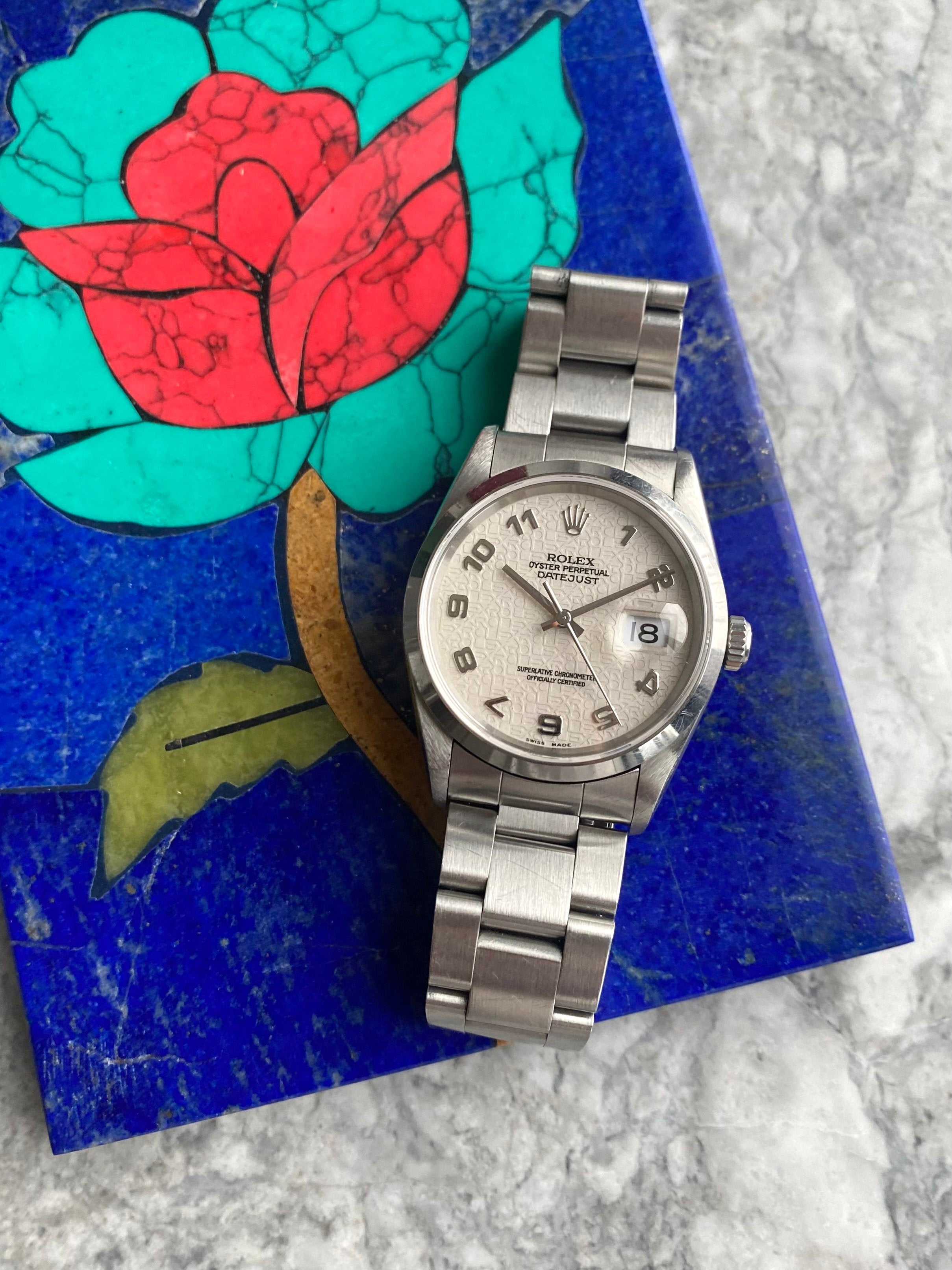 Rolex Datejust 16200 - Silver “Jubilee” Dial.