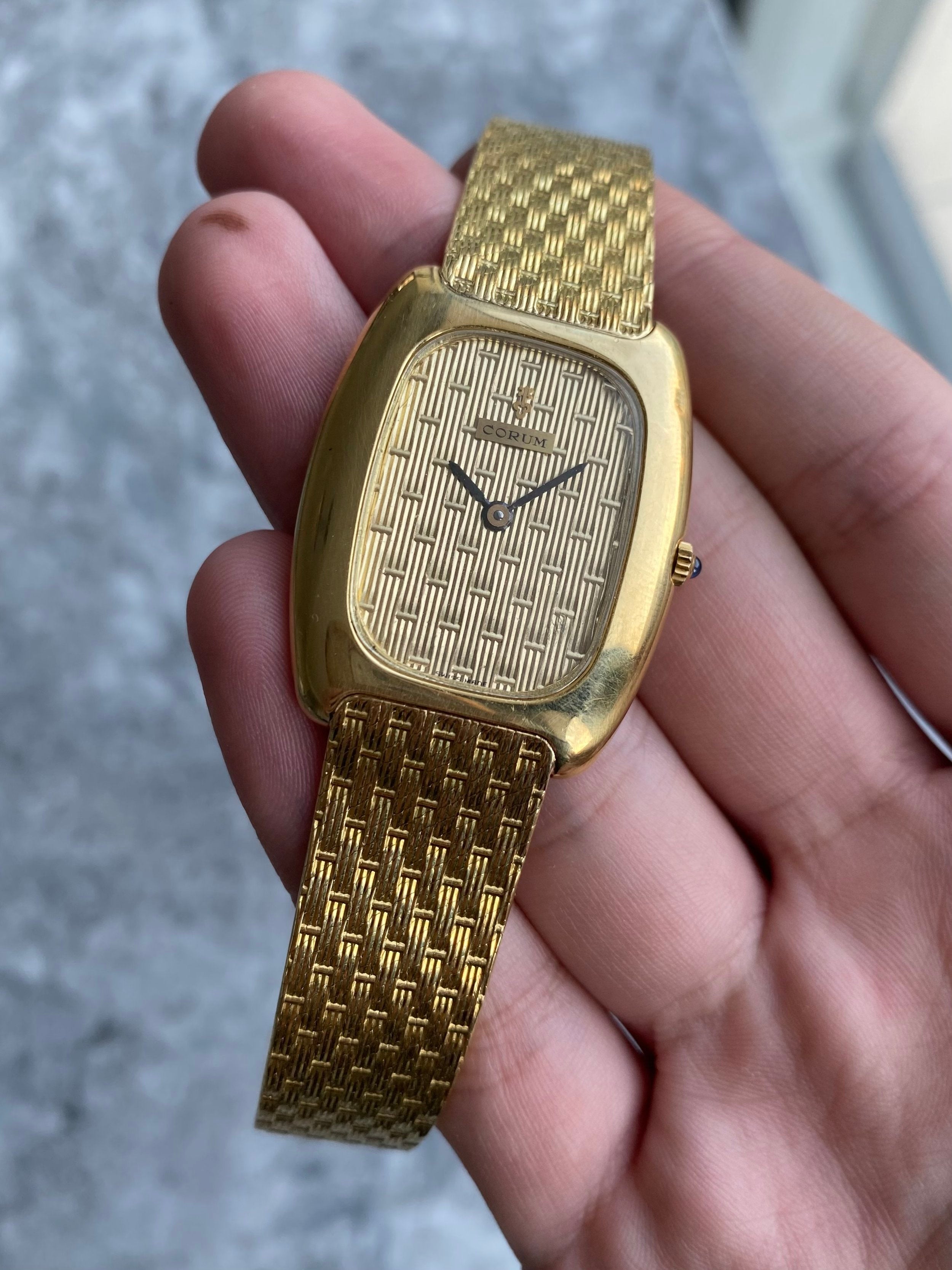 Corum - 18K Yellow Gold.