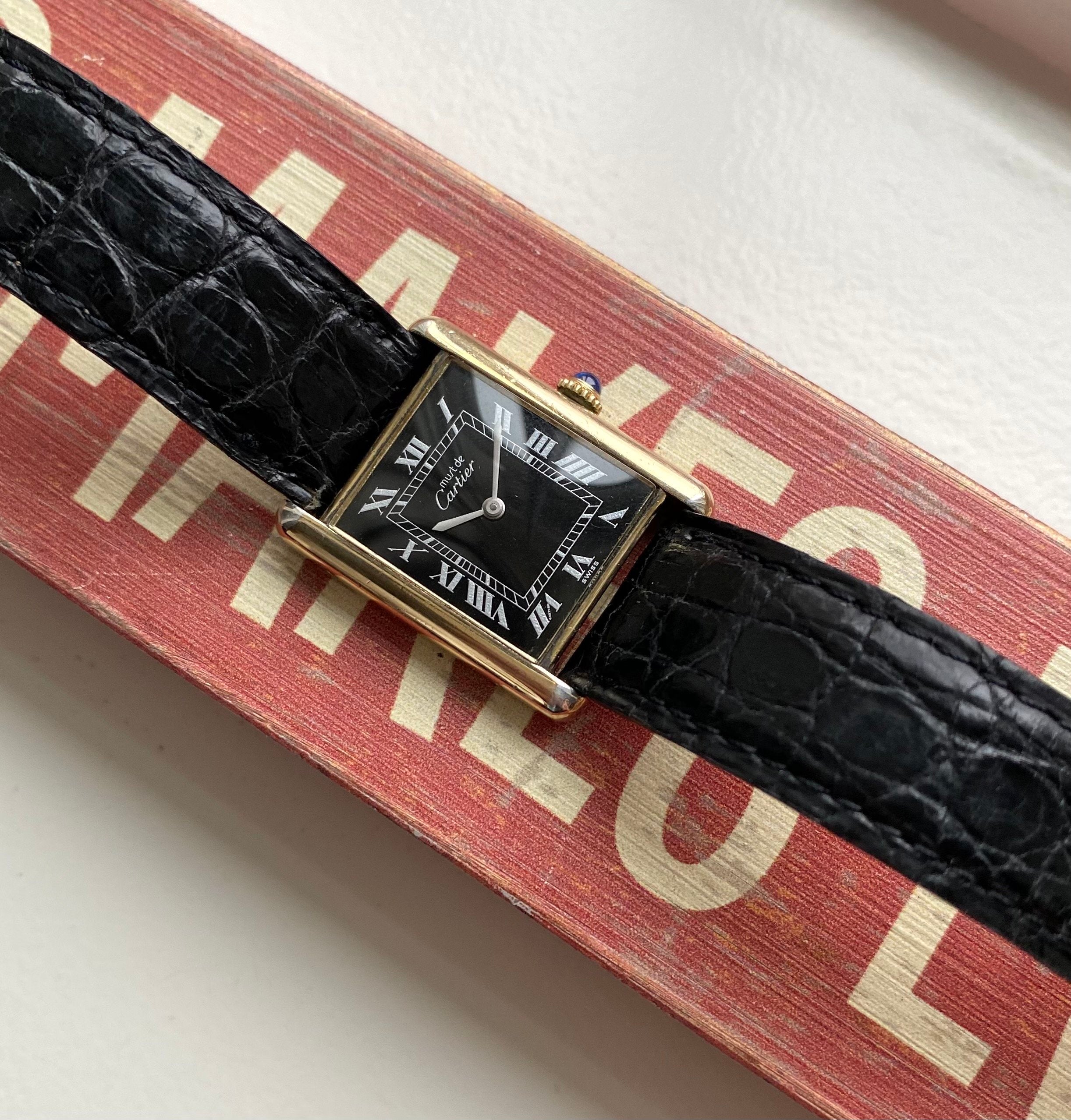 Cartier Tank — Black Roman Numeral Dial