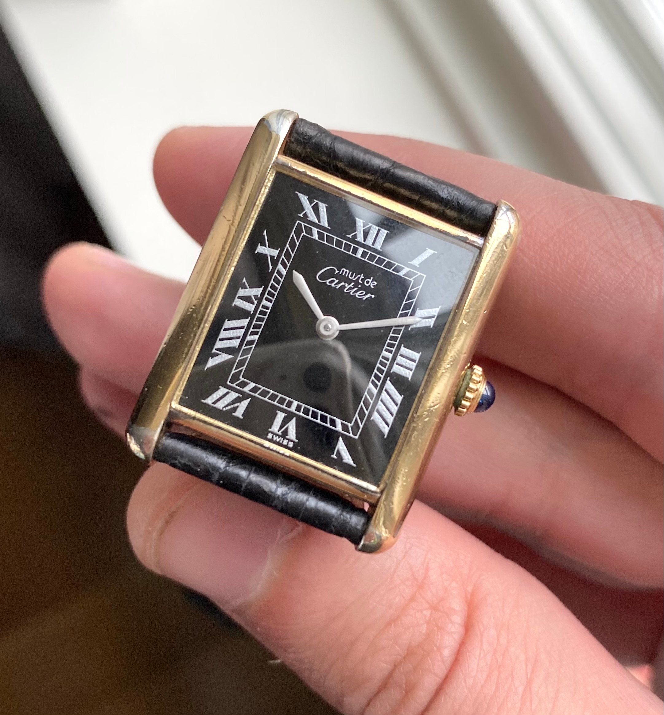 Cartier Tank — Black Roman Numeral Dial