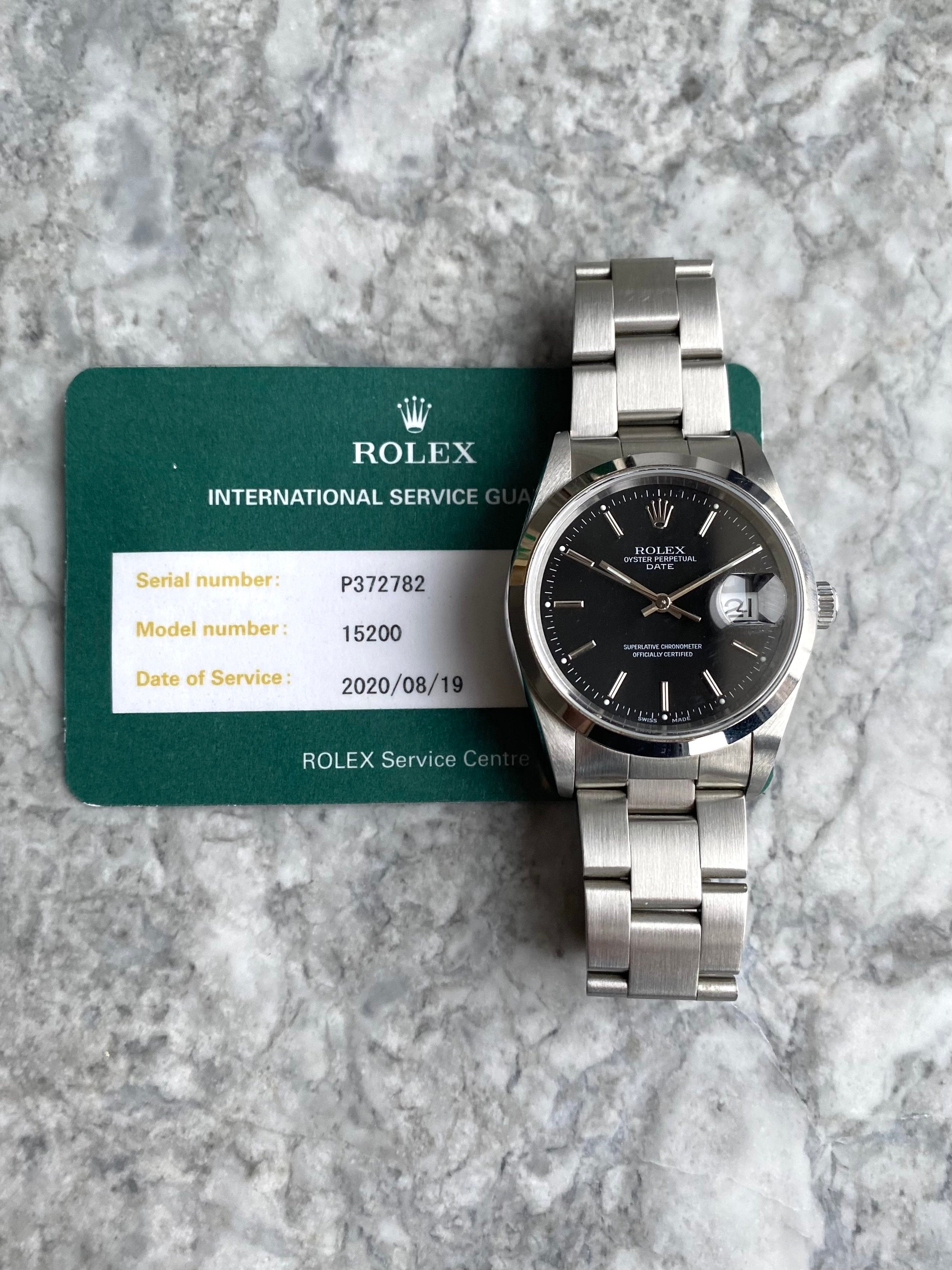 Rolex OP 15200 - Black w/ Service Card.