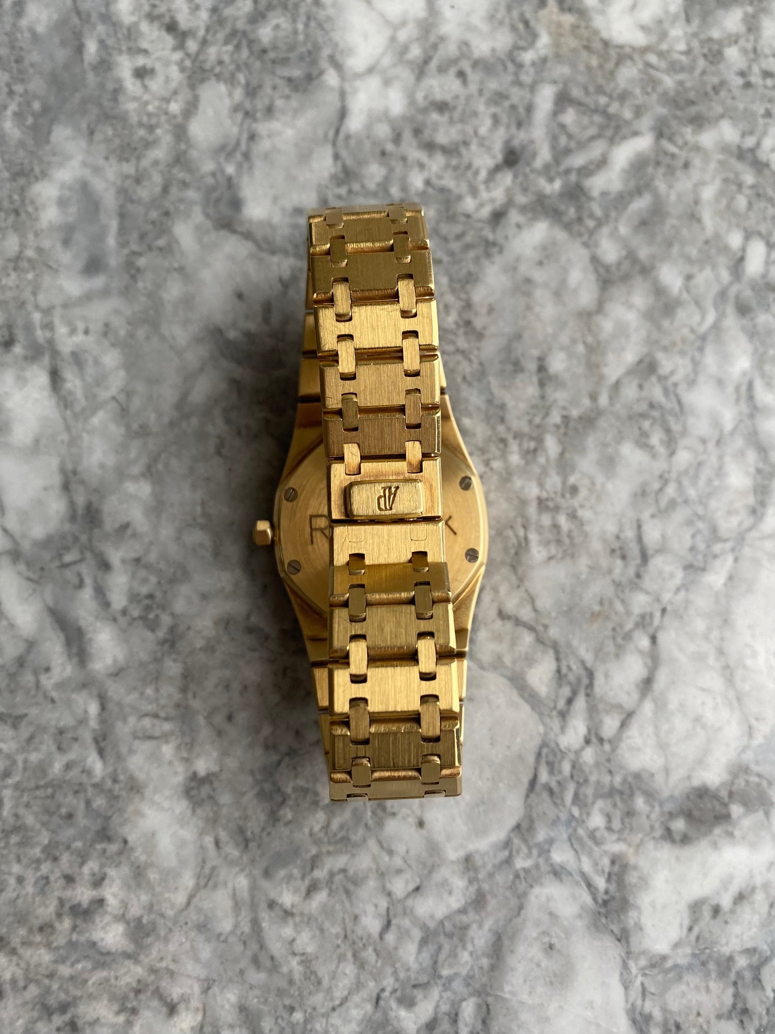 Audemars Piguet Royal Oak - 18K Yellow Gold.