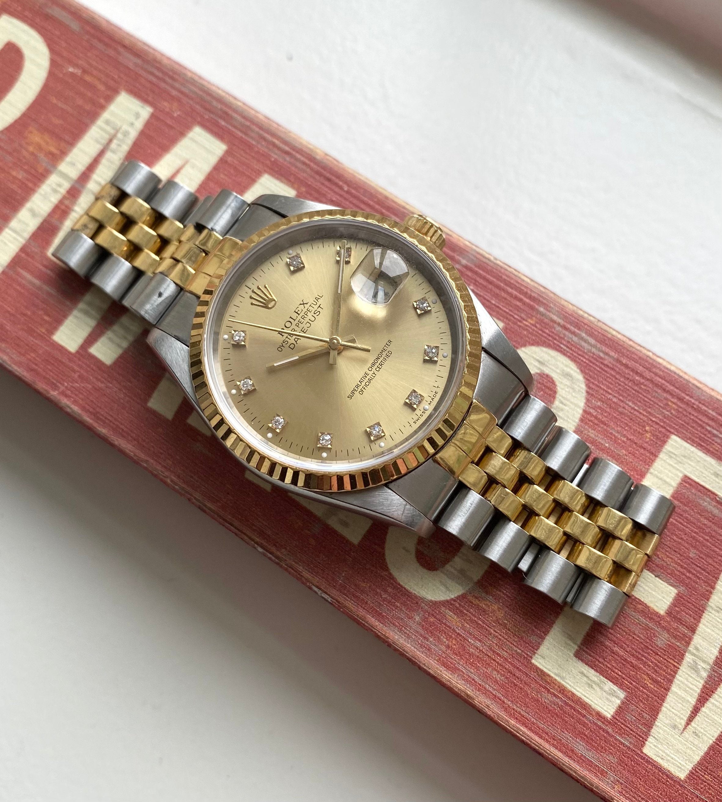 Rolex Datejust ref. 16233G — Champagne Diamond Dial