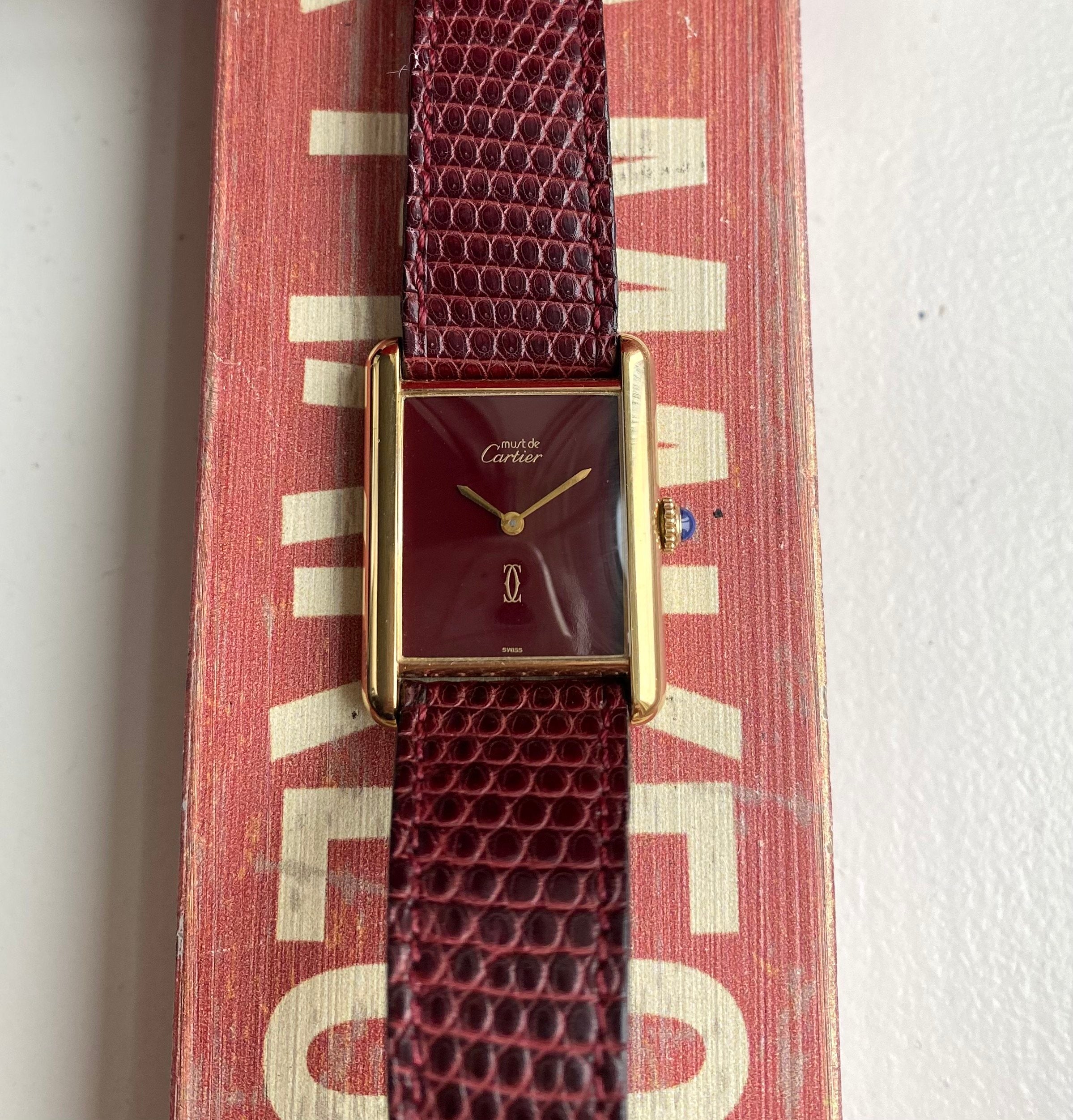 Cartier Tank — Maroon Dial