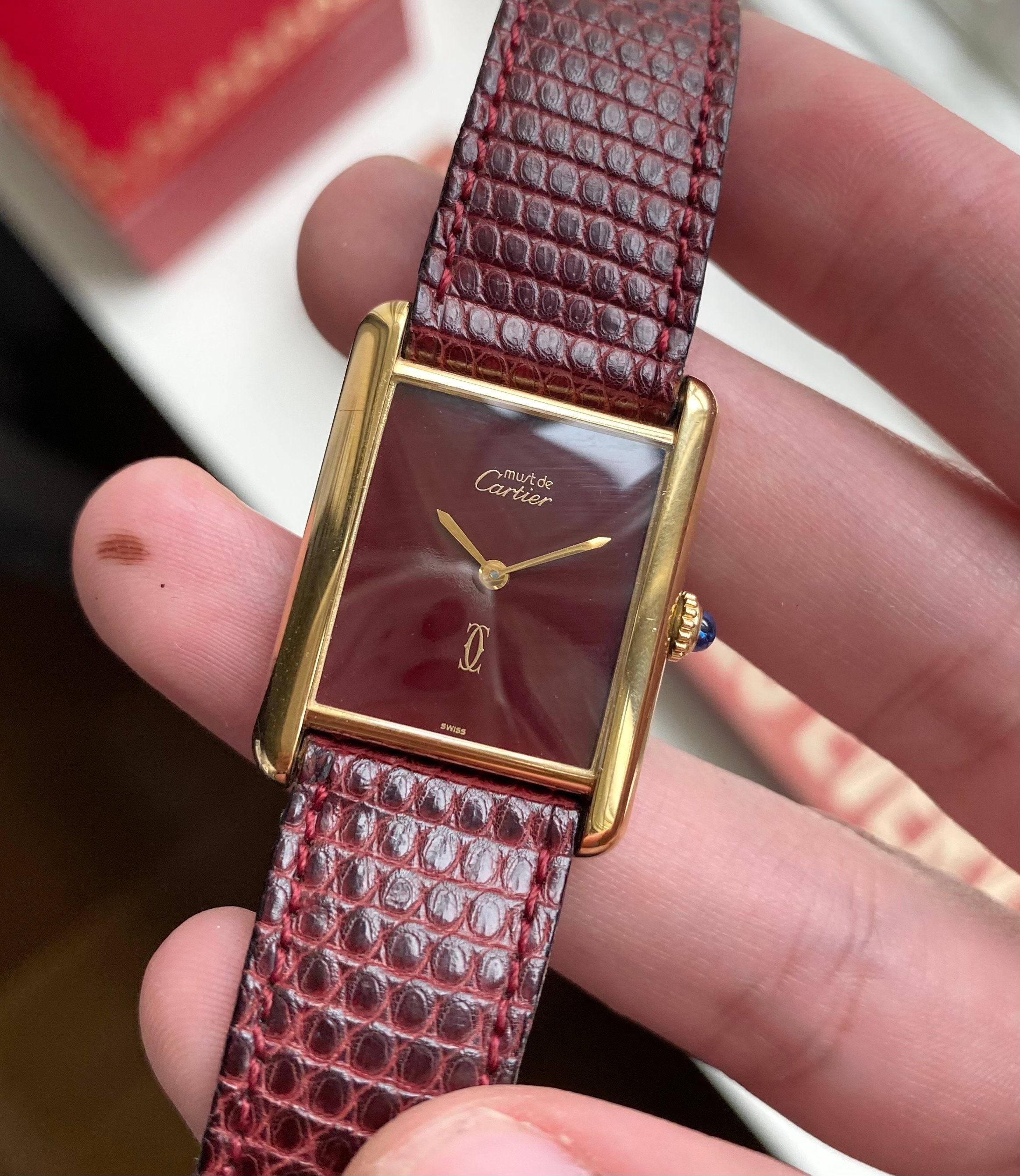 Cartier Tank — Maroon Dial